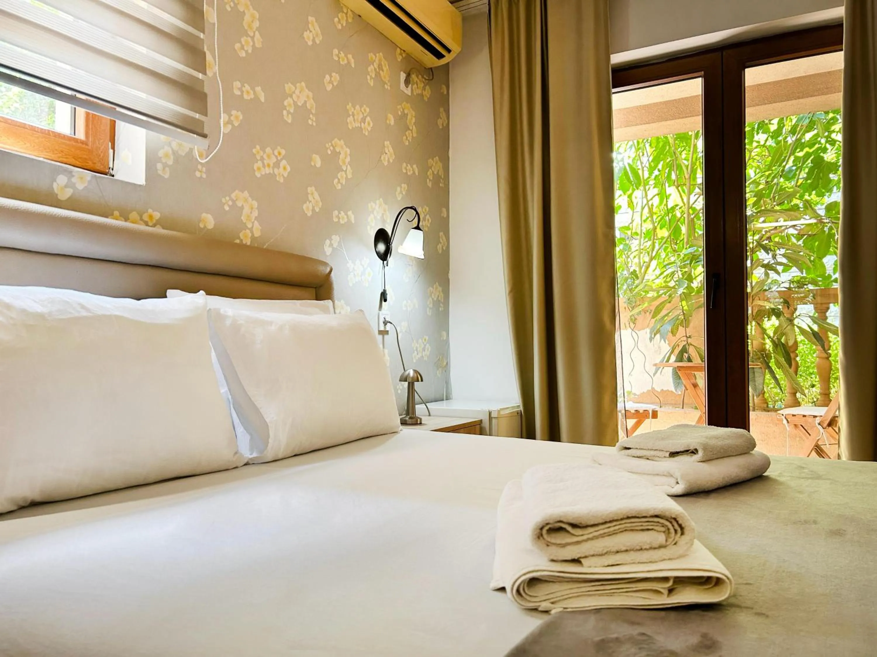 Bed in Central Hotel & Restaurant