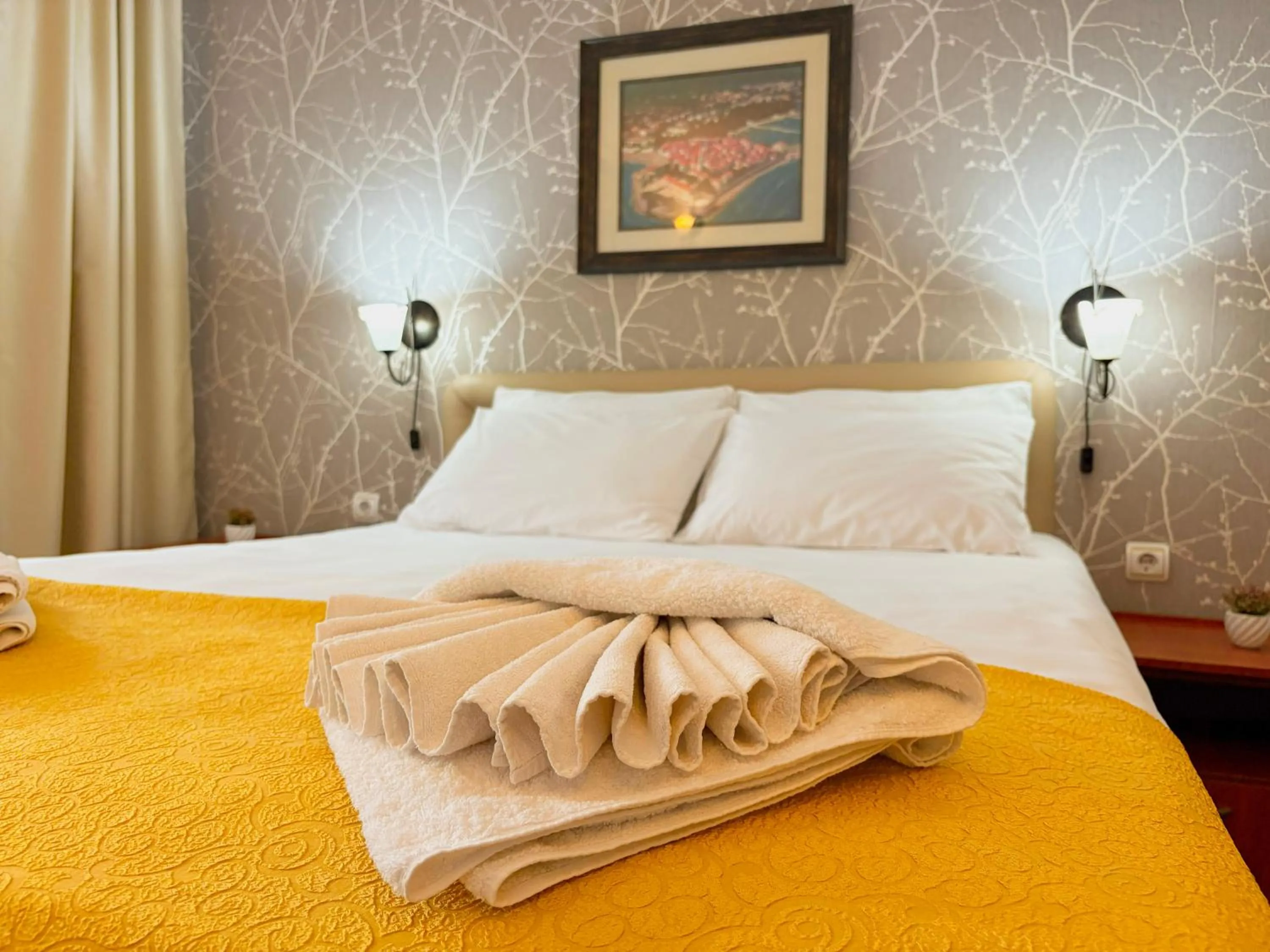 Bed in Central Hotel & Restaurant