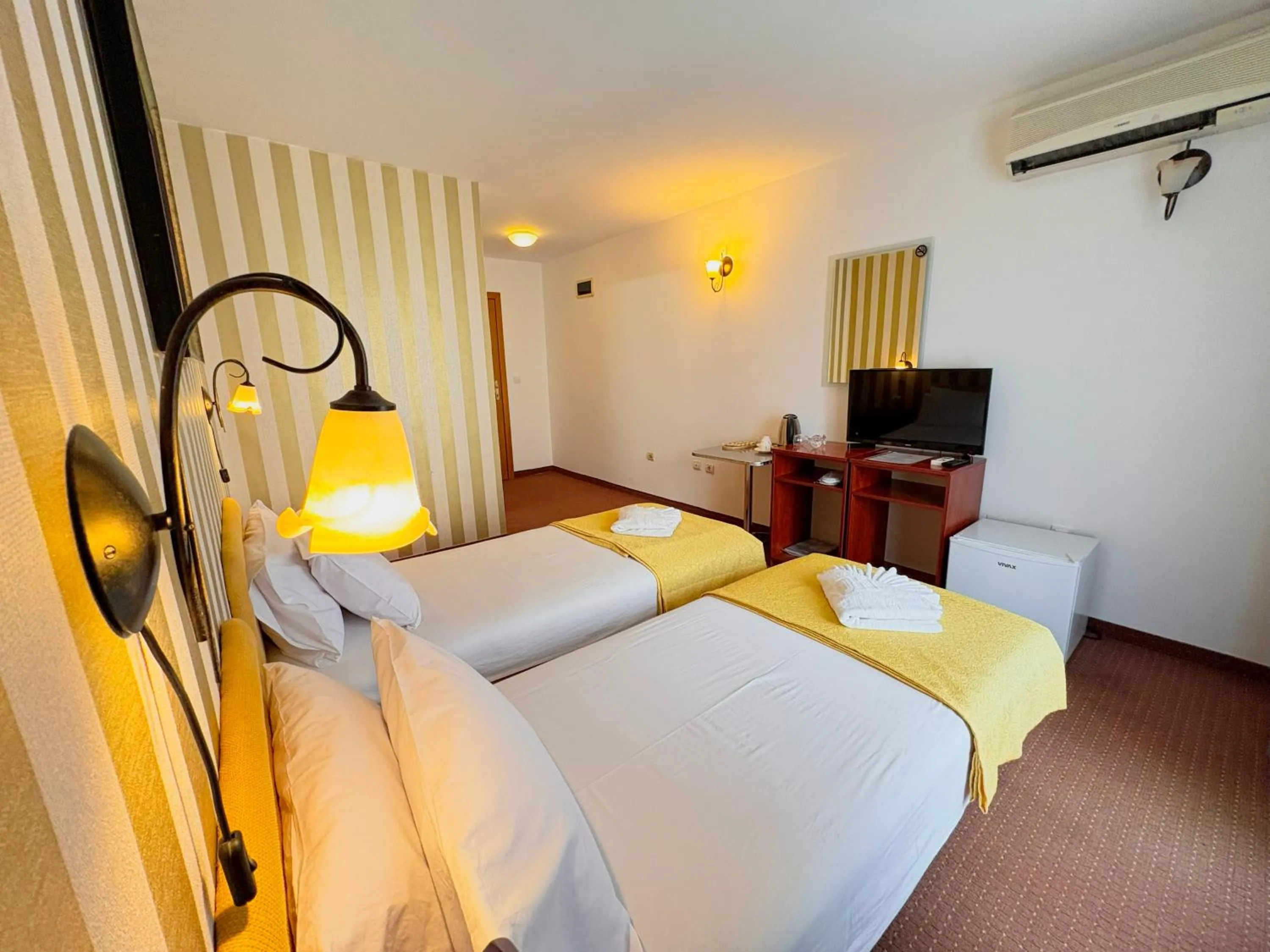 Photo of the whole room, Bed in Central Hotel & Restaurant