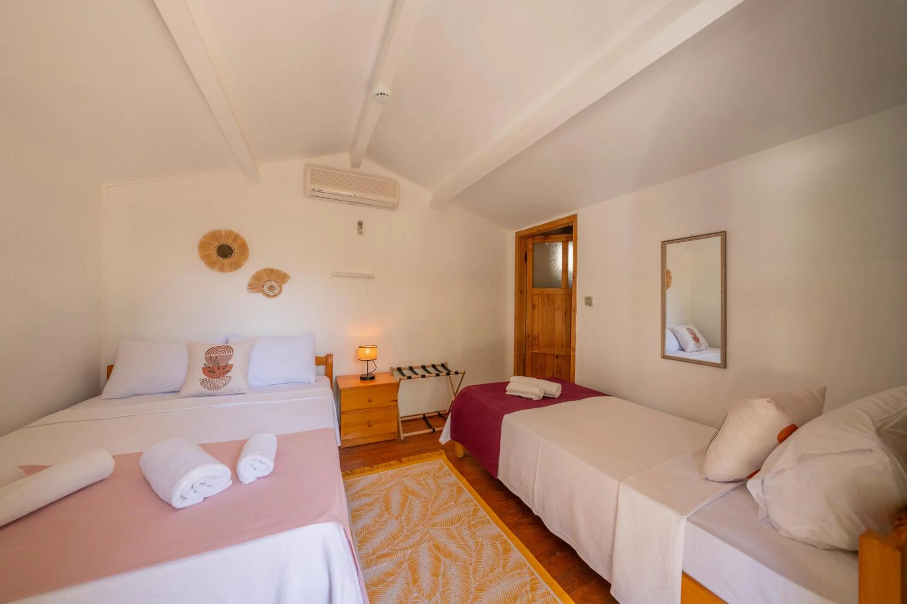 Bed in La Dia Hotel Faralya