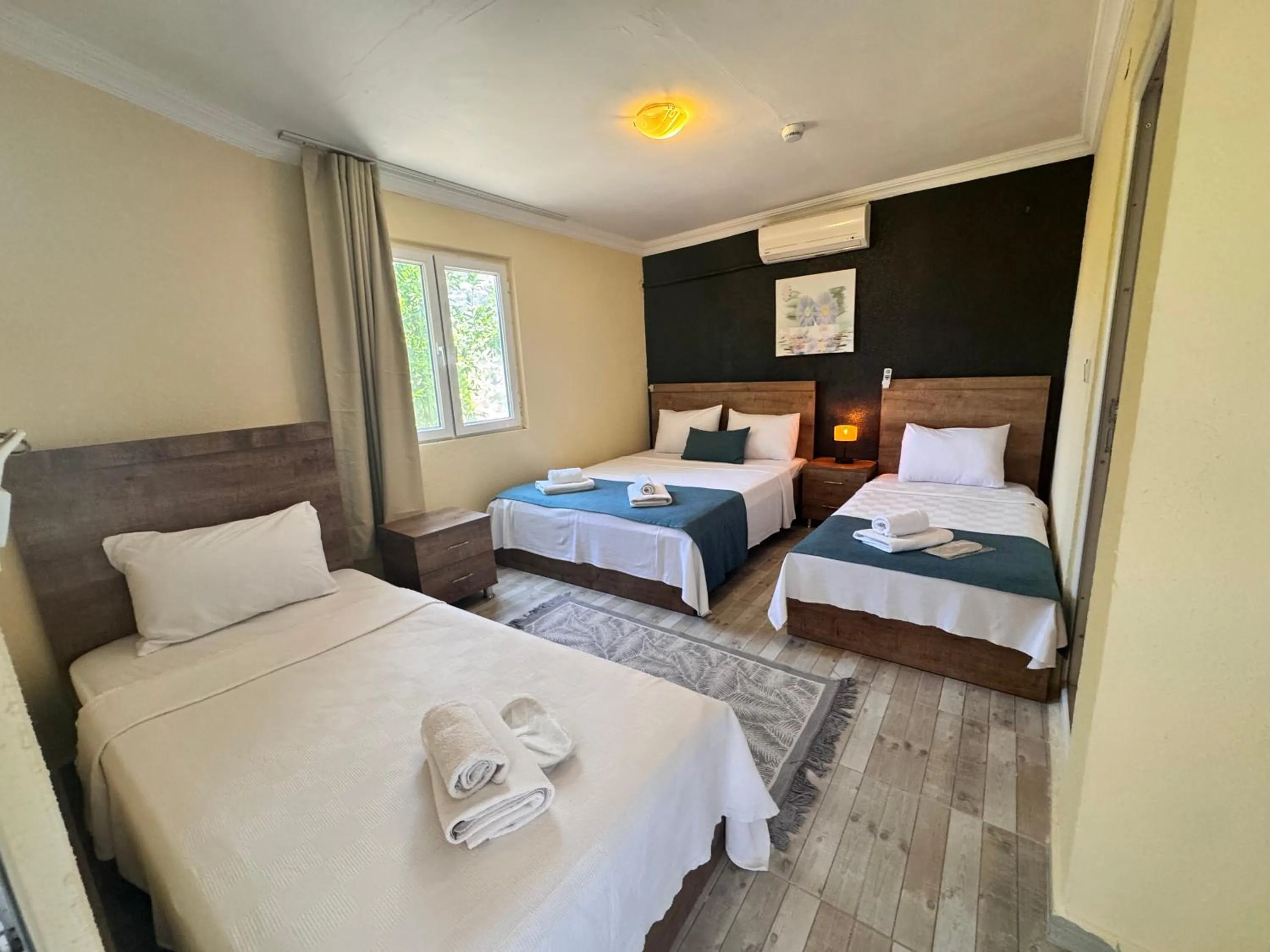 Bed in La Dia Hotel Faralya