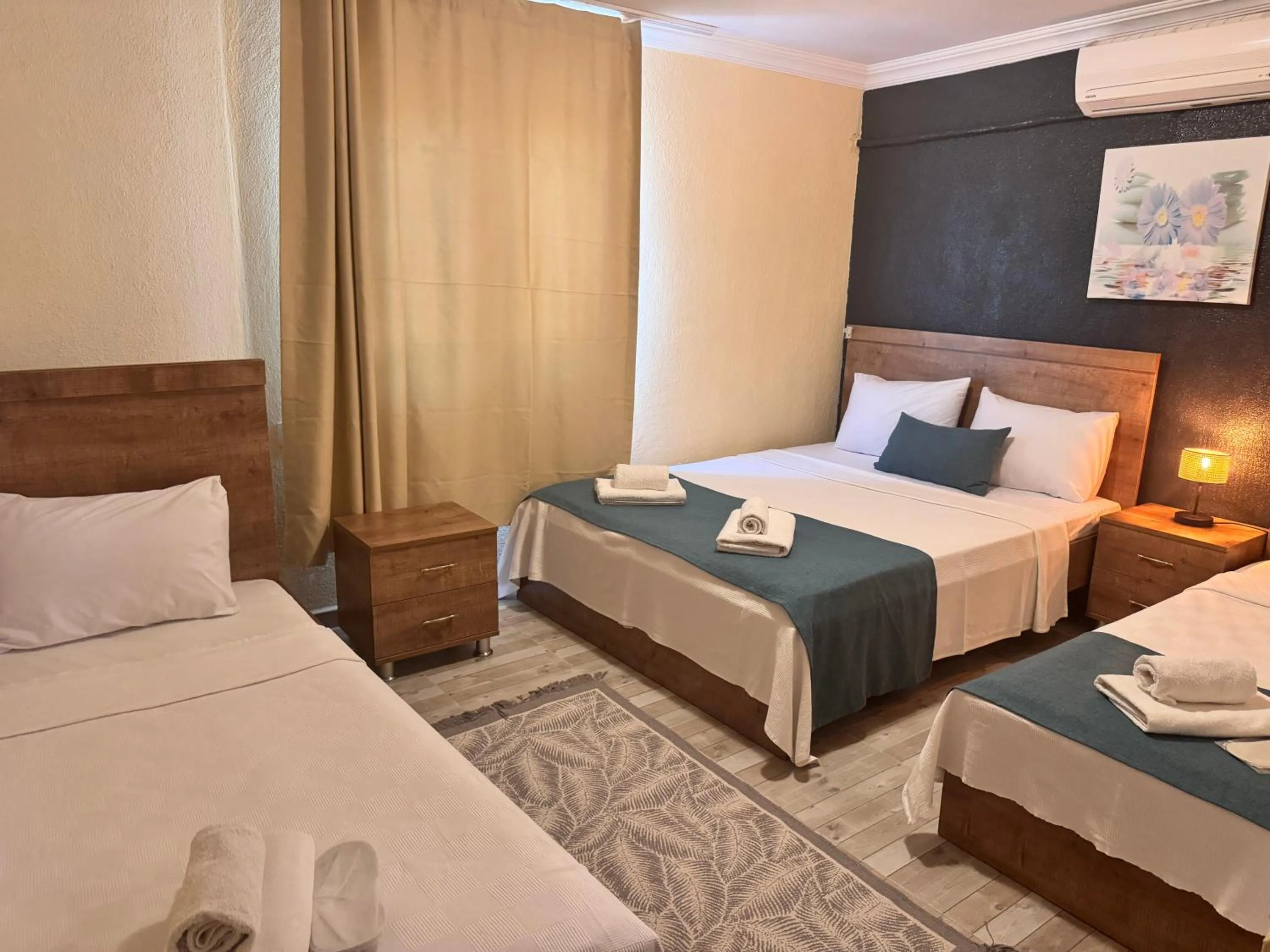 Bed in La Dia Hotel Faralya