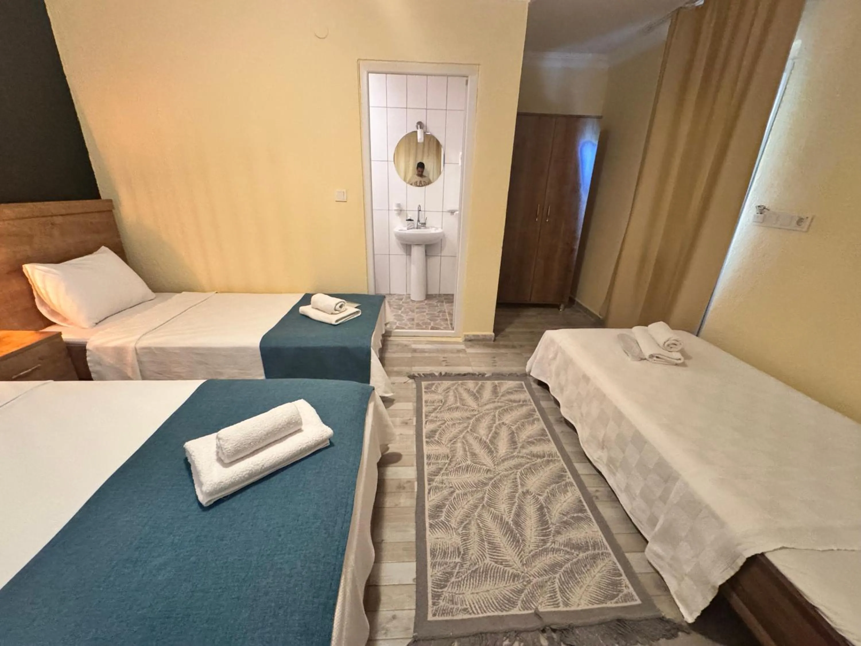 Bed in La Dia Hotel Faralya
