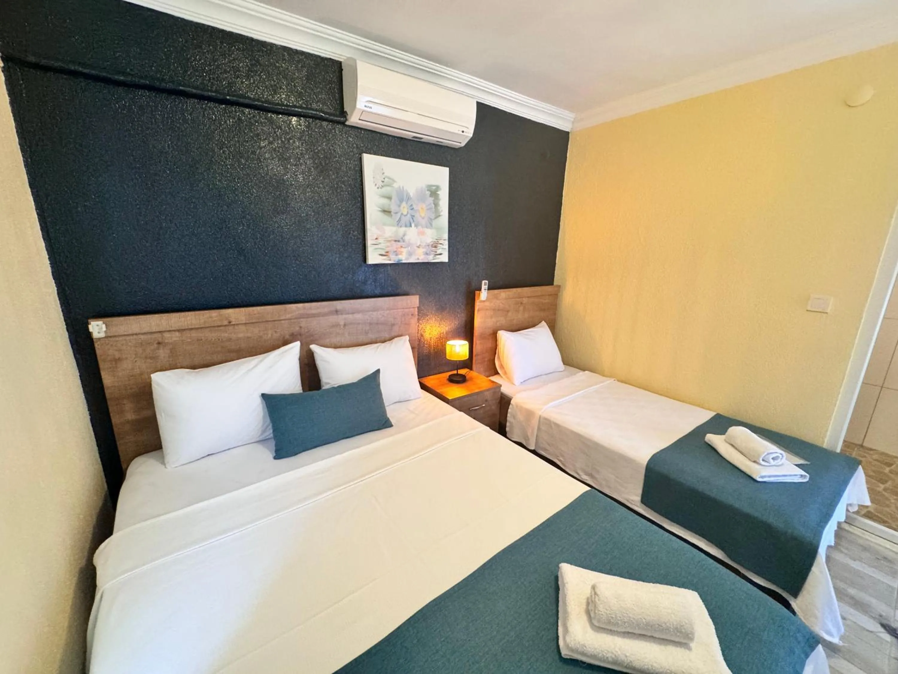 Bed in La Dia Hotel Faralya