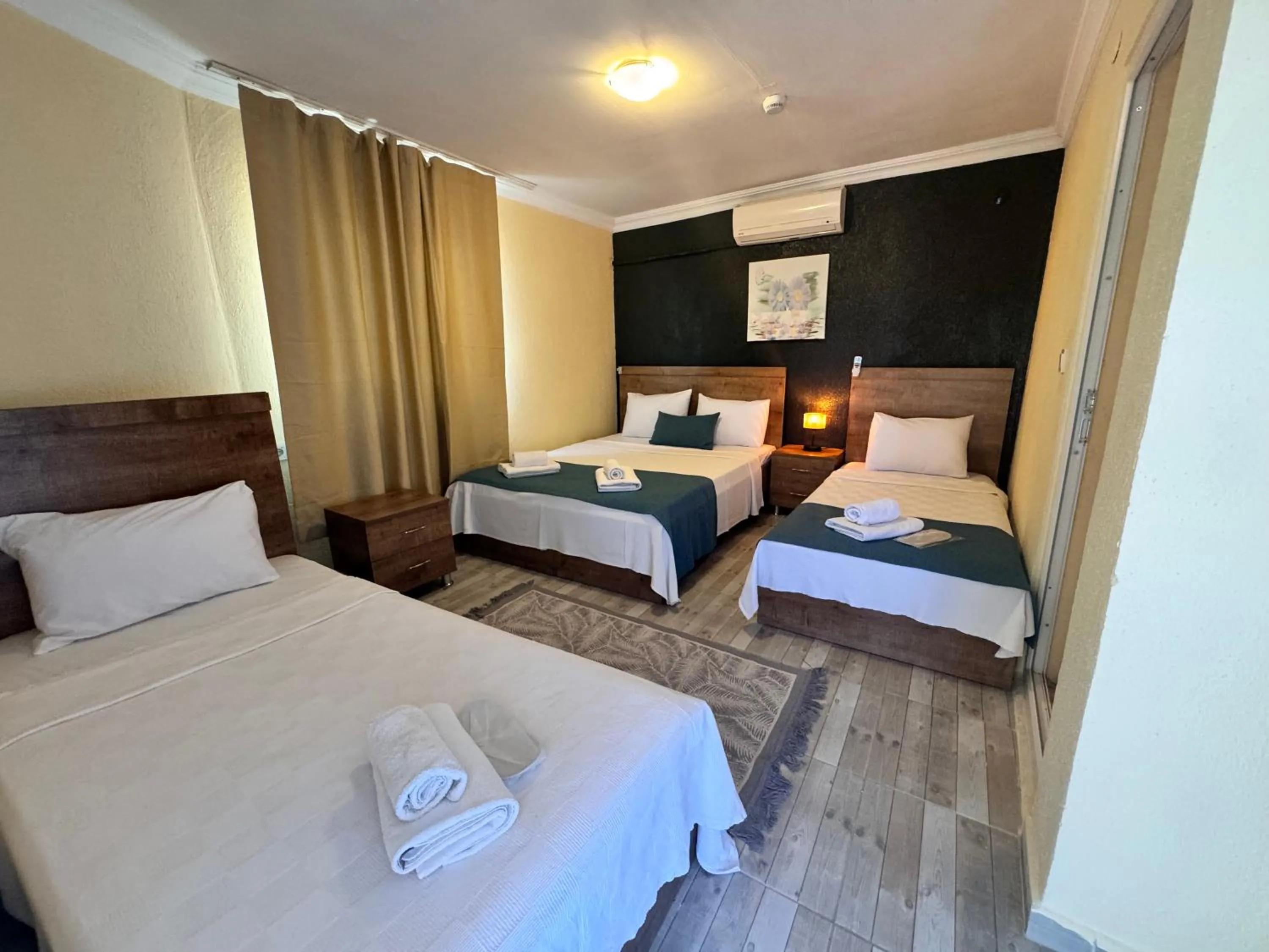 Bed in La Dia Hotel Faralya