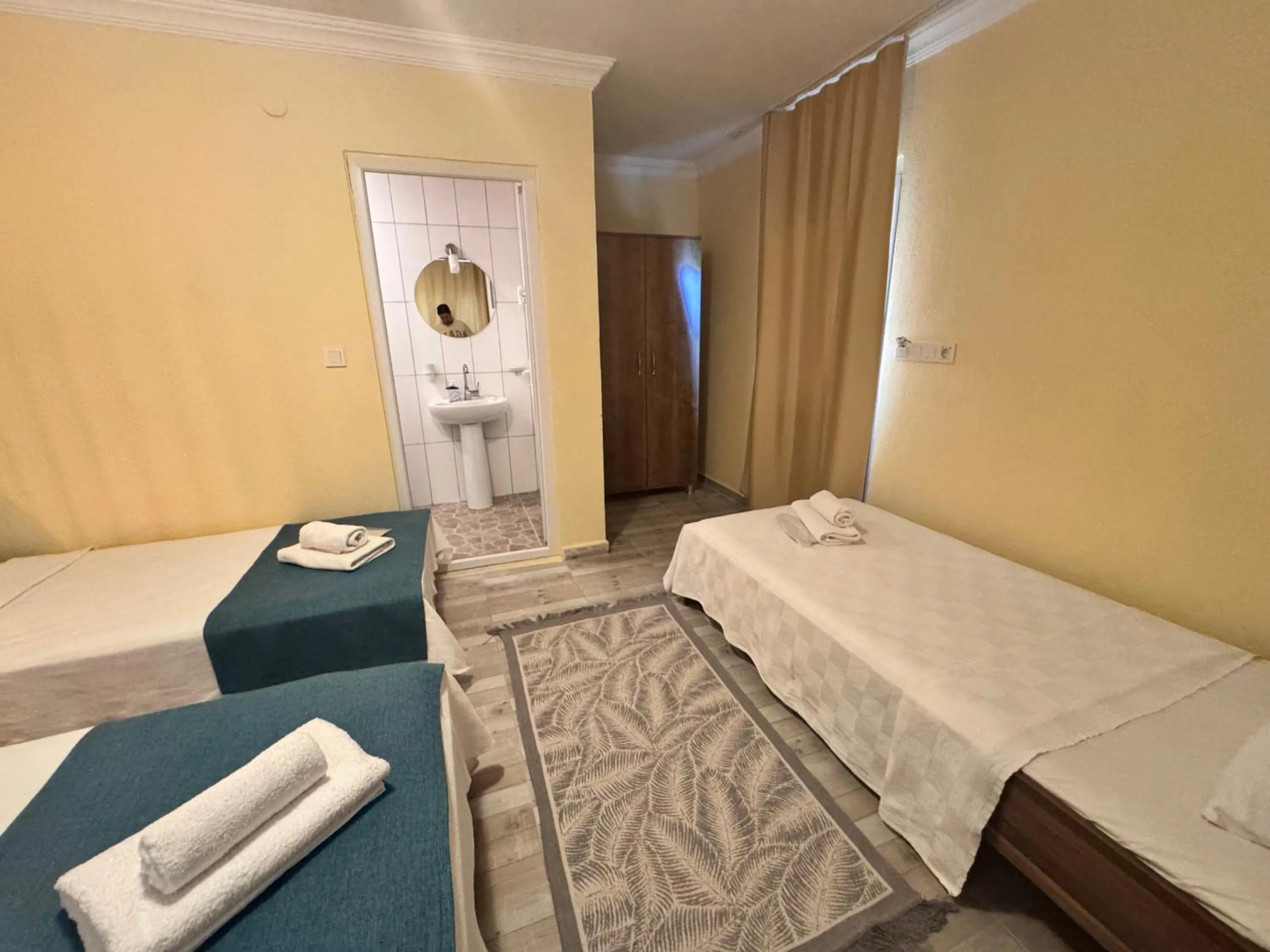Bed in La Dia Hotel Faralya