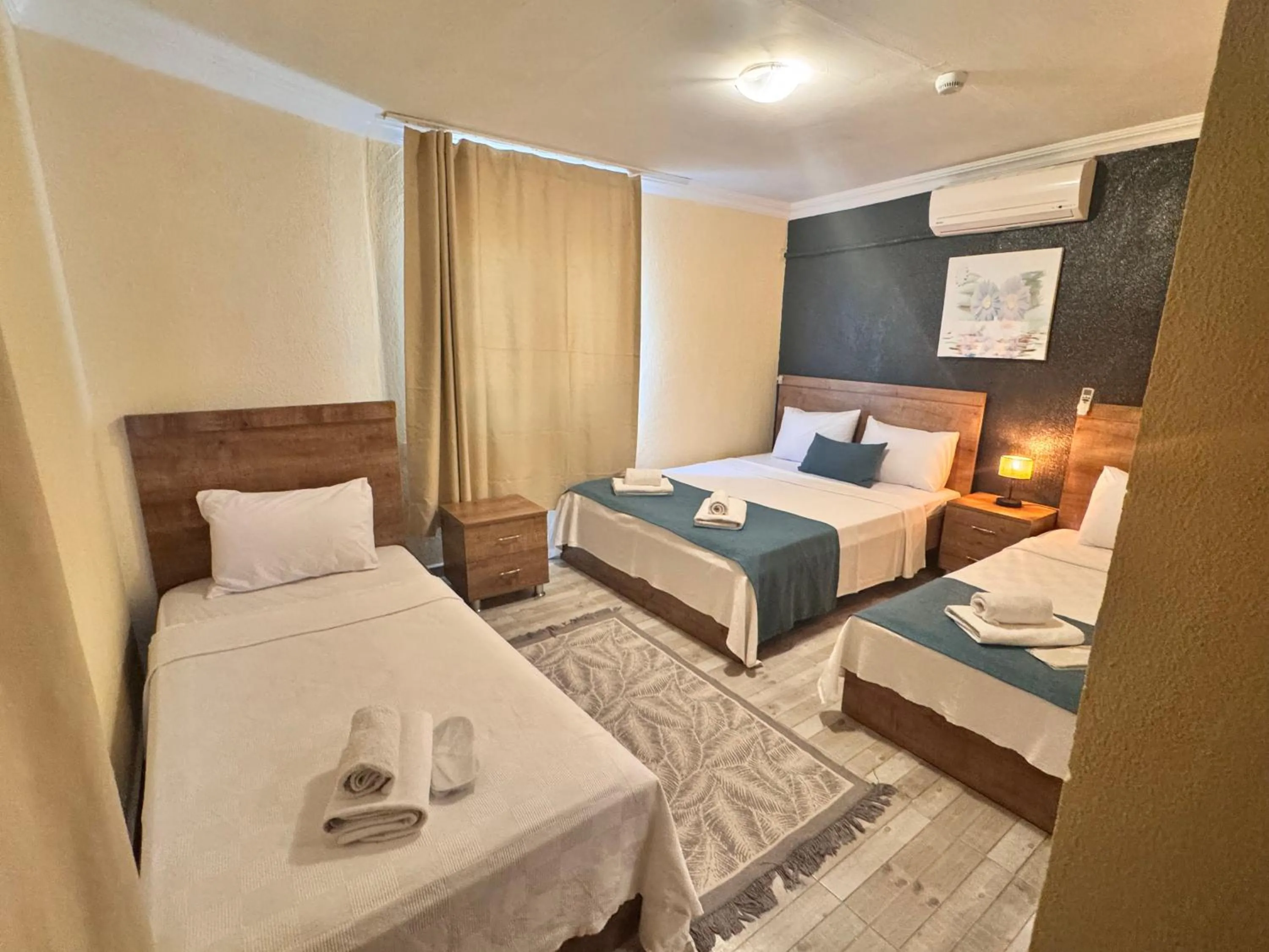 Bed in La Dia Hotel Faralya