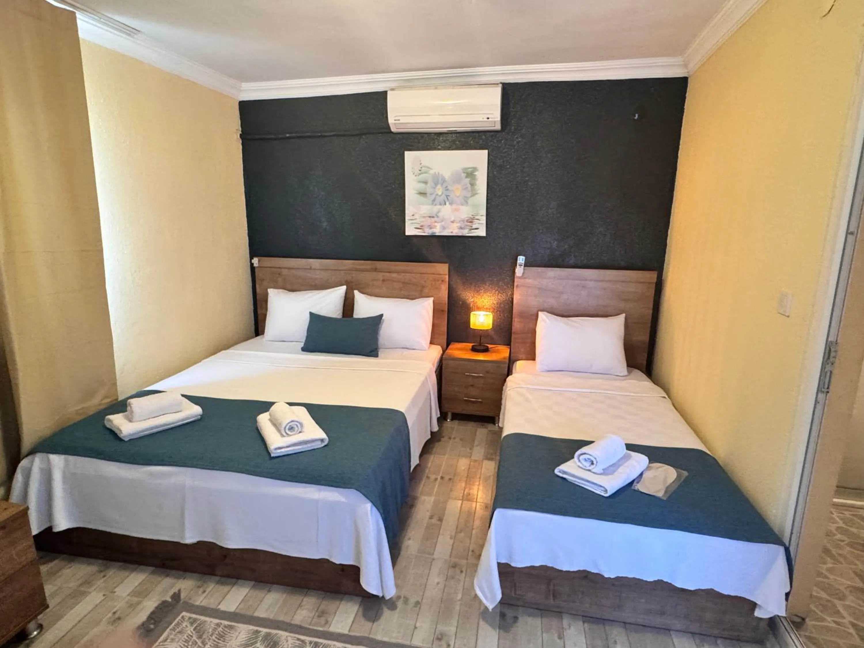 Bed in La Dia Hotel Faralya