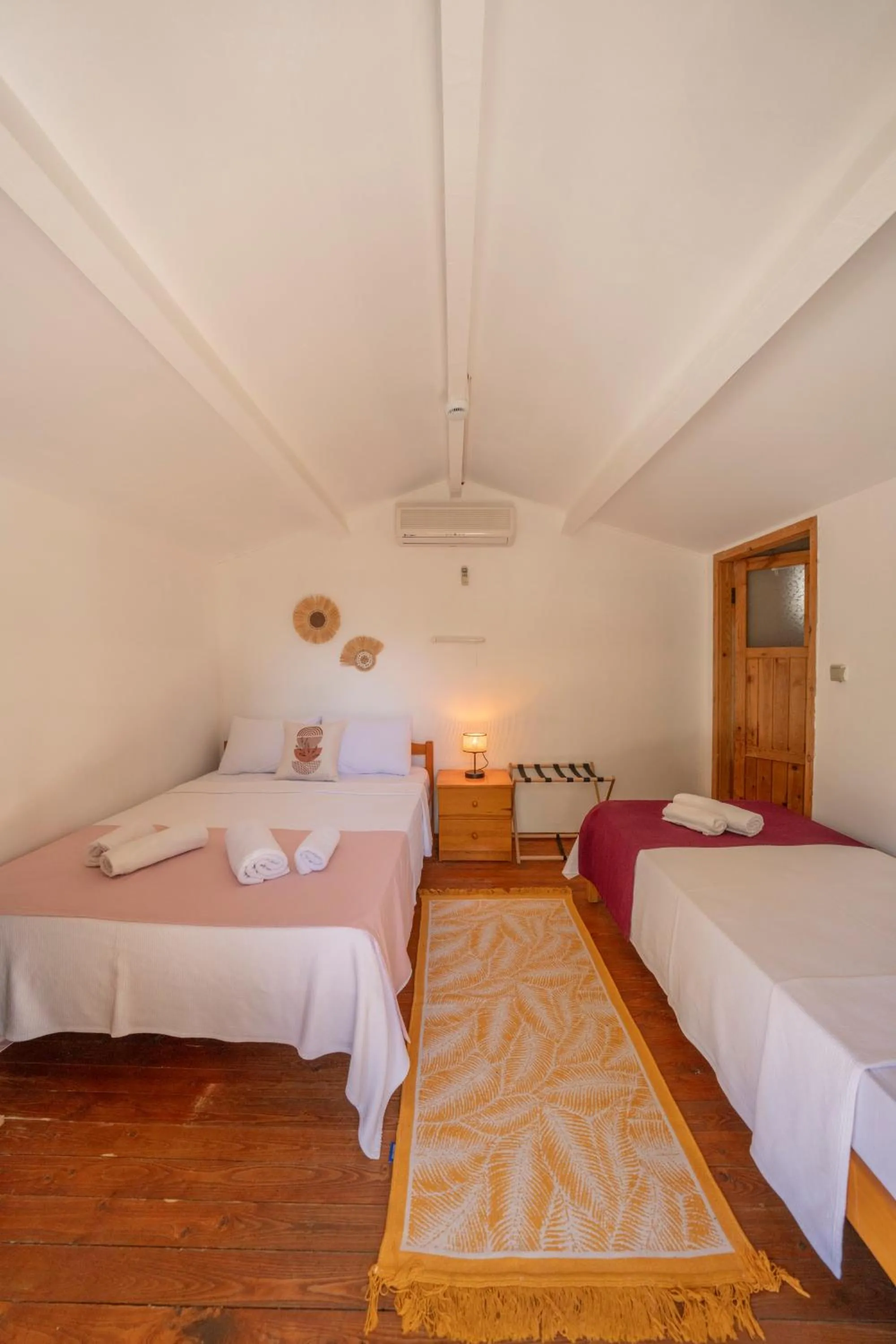 Bed in La Dia Hotel Faralya