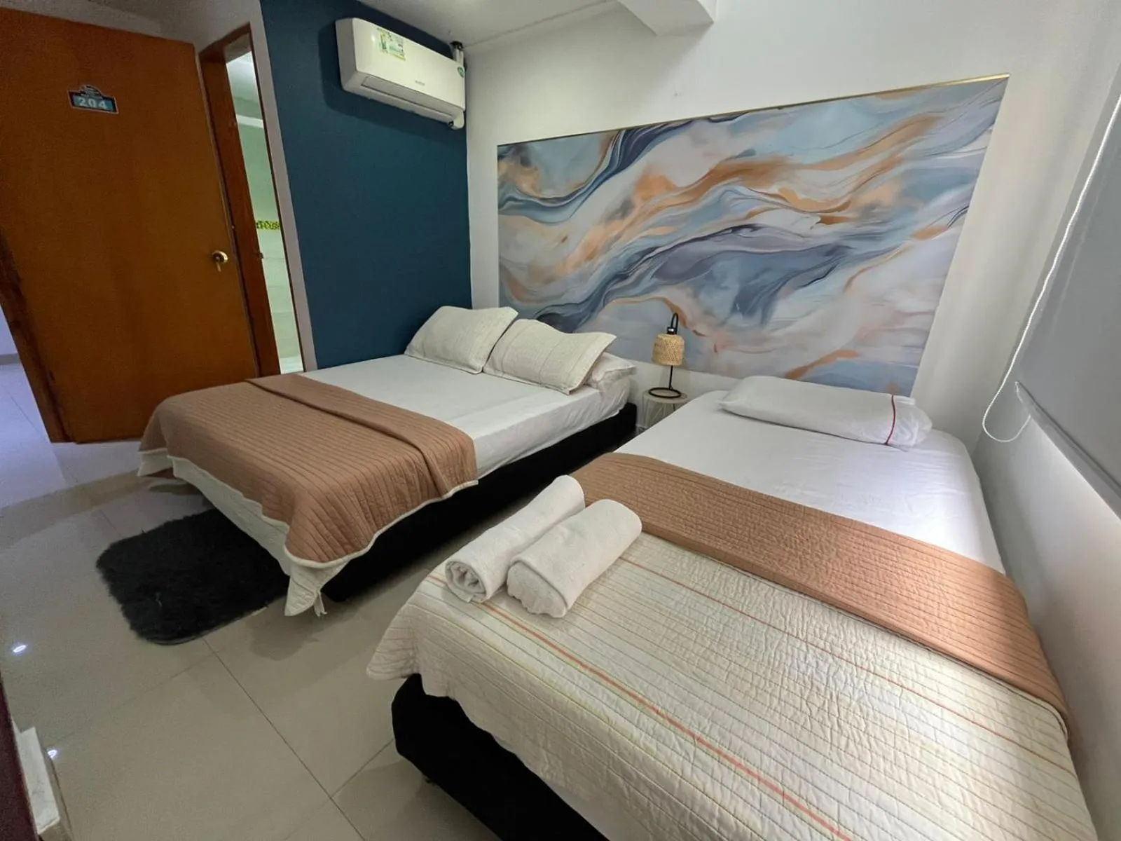 Bed in Sweet Caribbean Airport Hotel