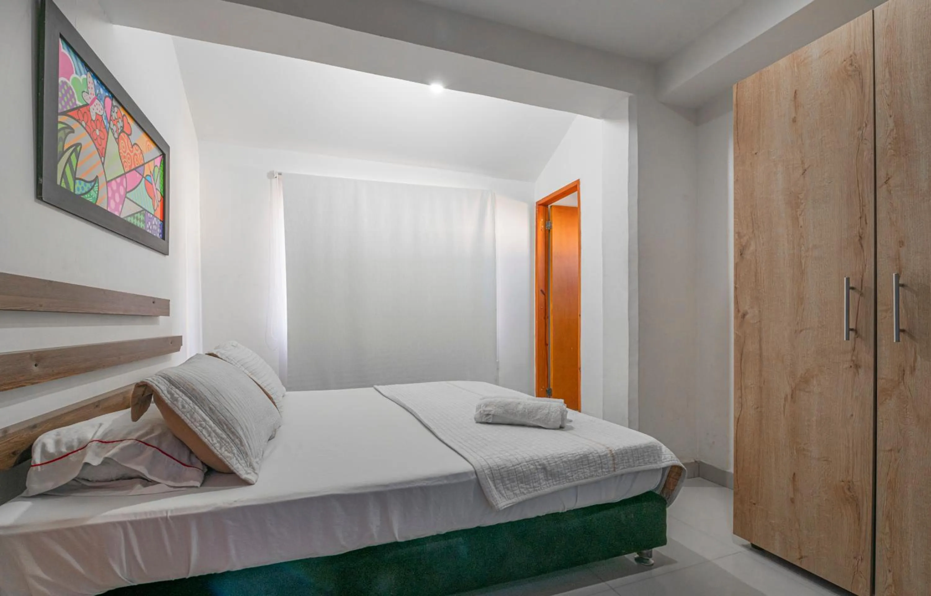 Bed in Sweet Caribbean Airport Hotel