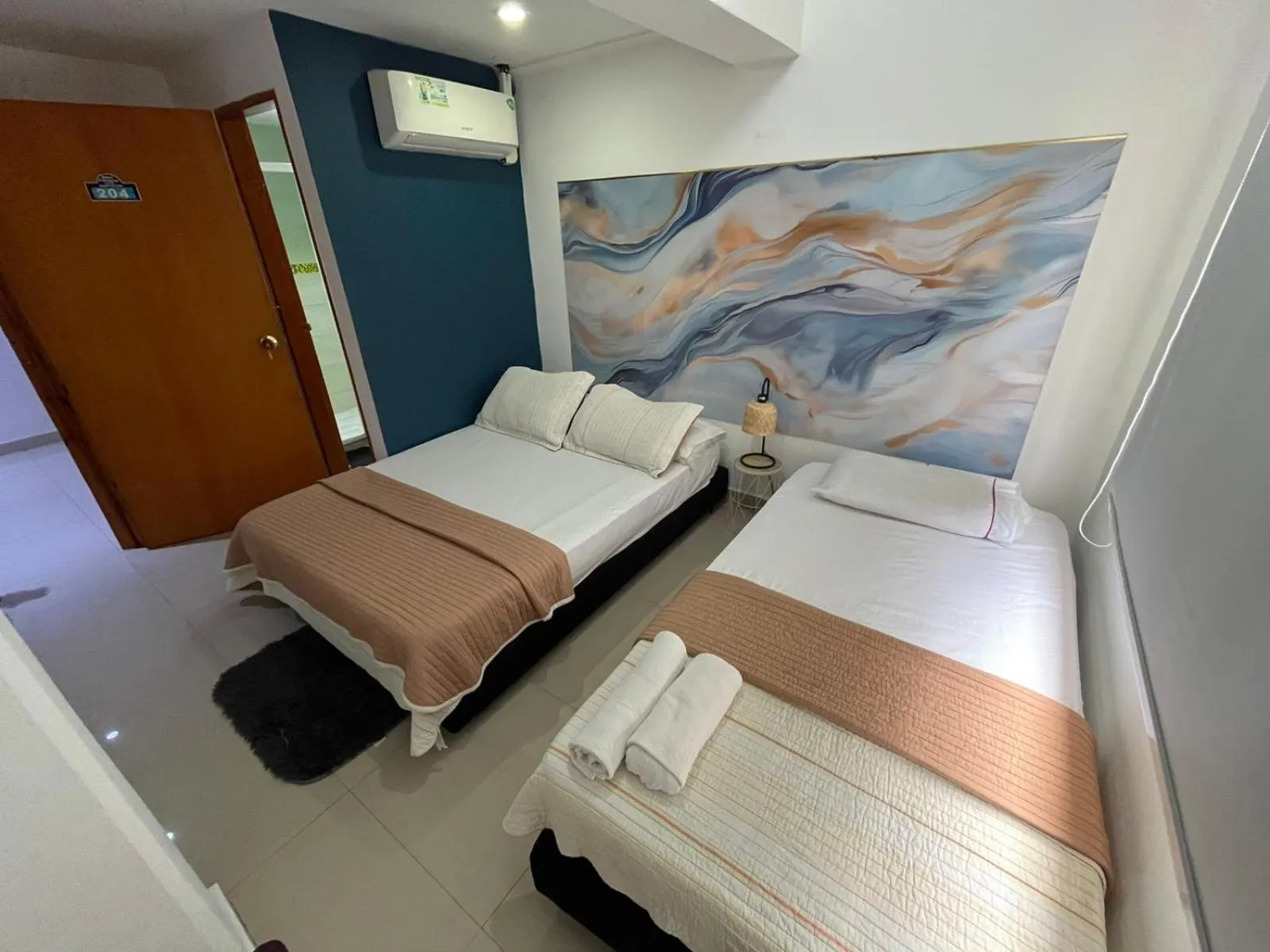 Bed in Sweet Caribbean Airport Hotel