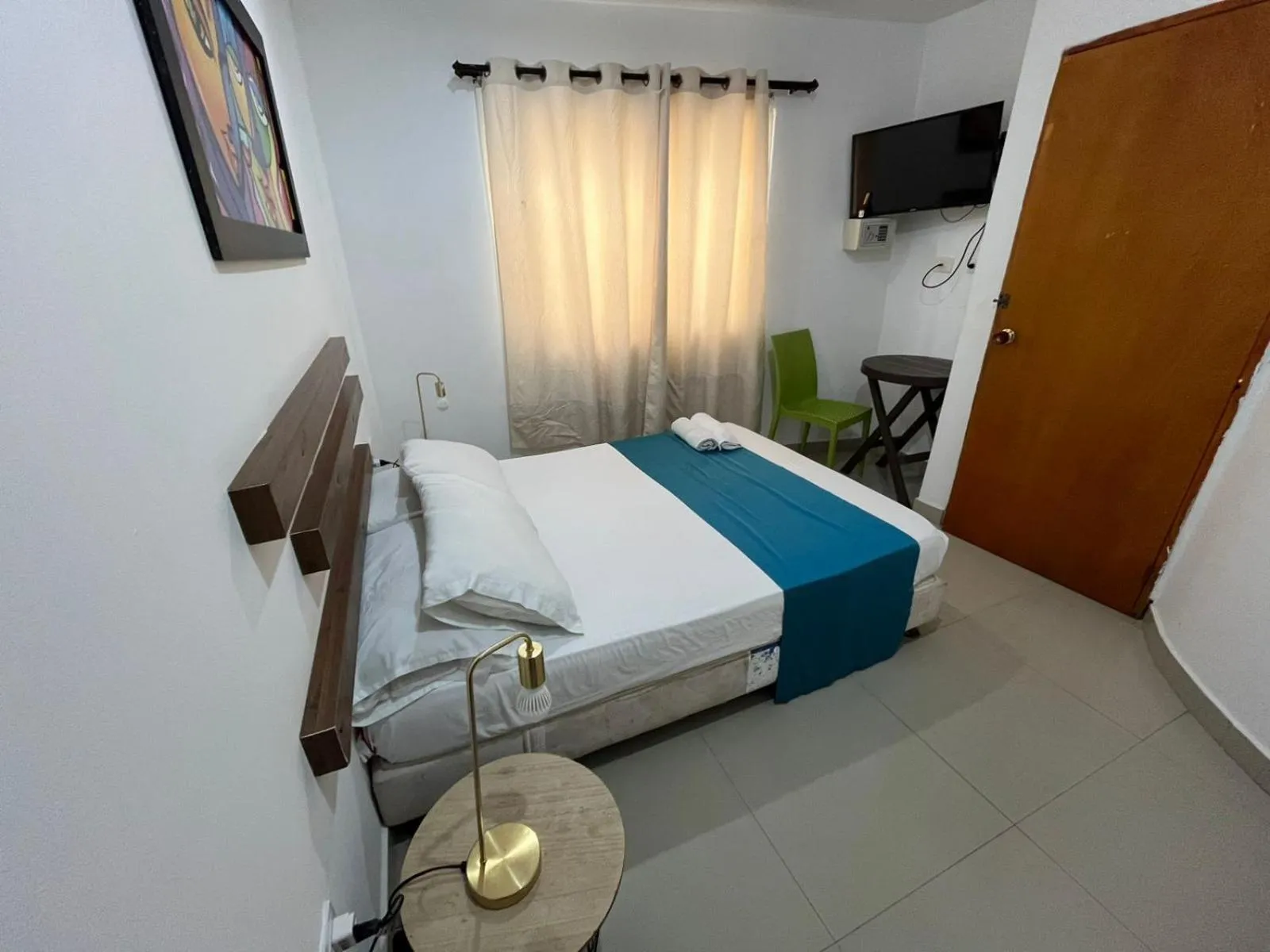 Bed in Sweet Caribbean Airport Hotel