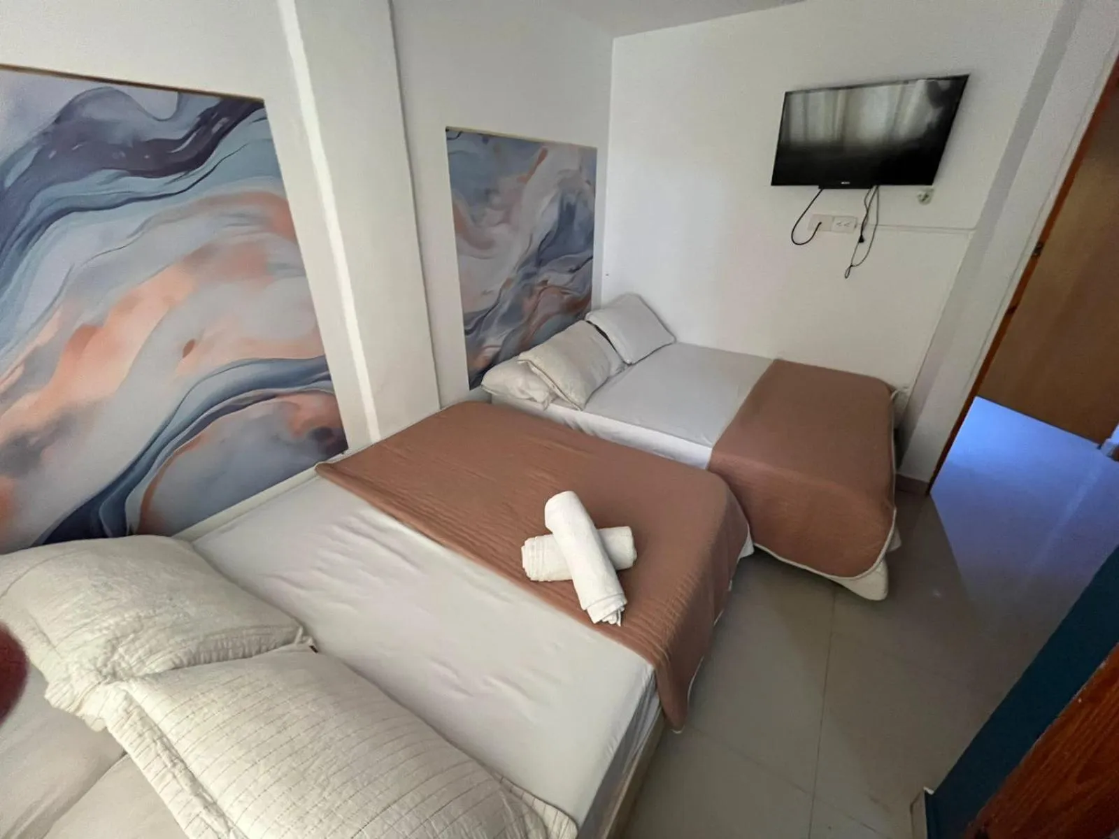 Bed in Sweet Caribbean Airport Hotel