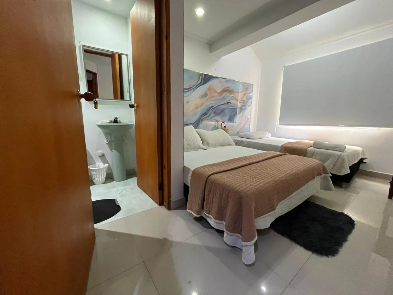 Bed in Sweet Caribbean Airport Hotel