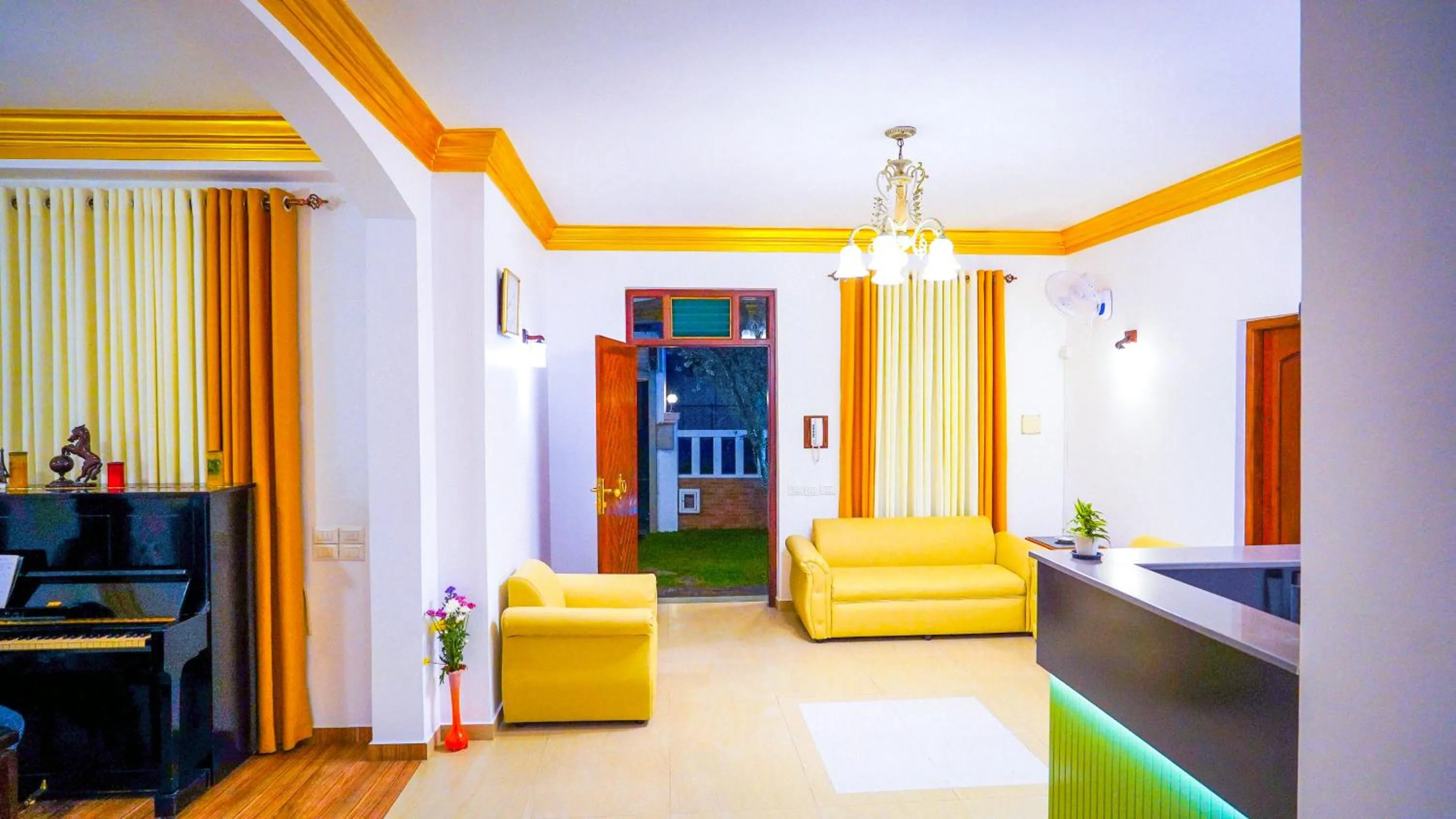 Seating area, Bed in Serene Villa Airport Transit