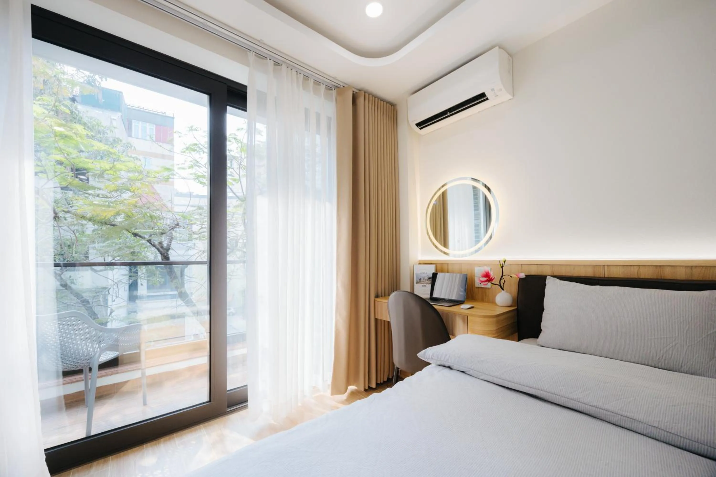 Bed in Wisteria Apartment Hanoi