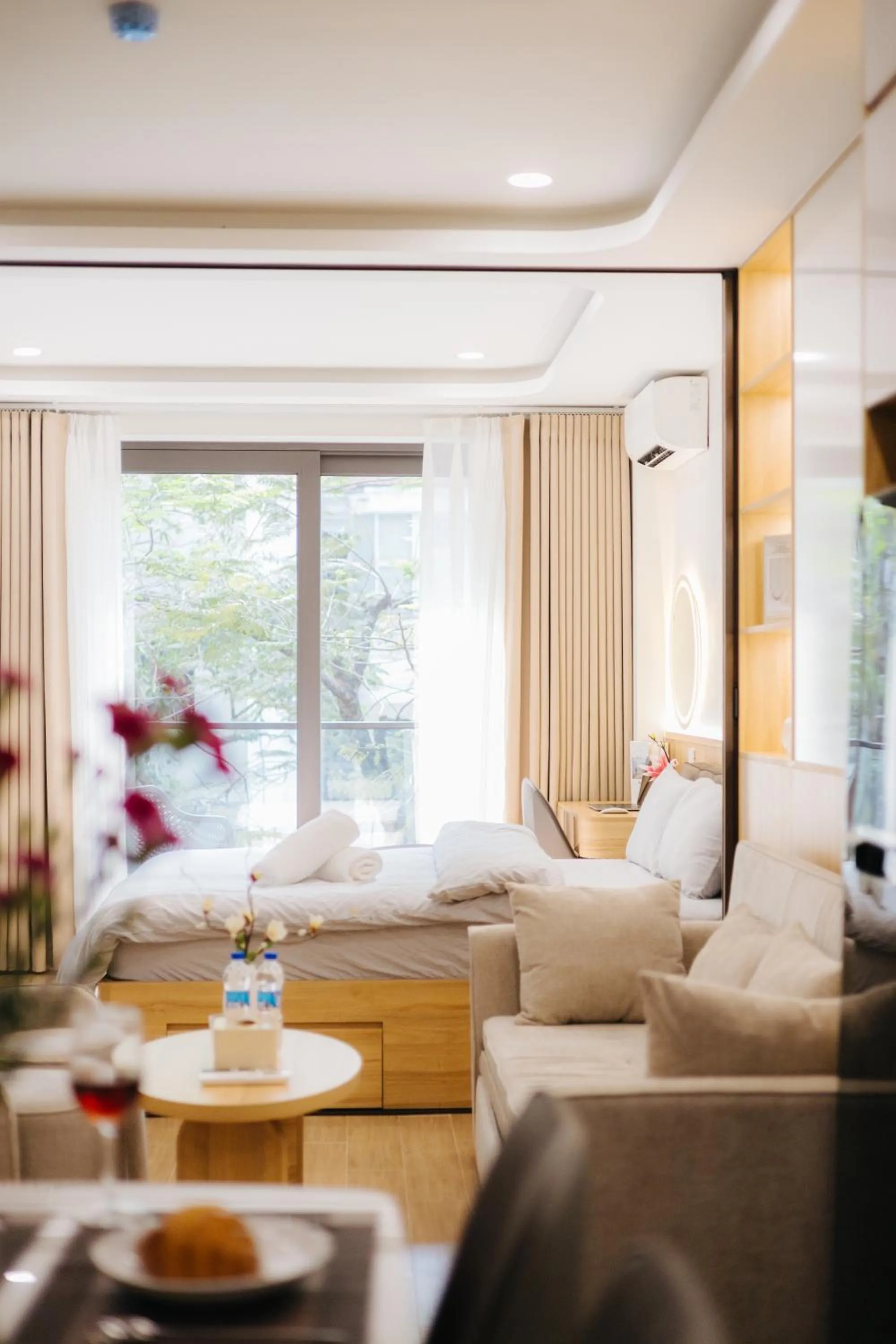 Living room, Bed in Wisteria Apartment Hanoi