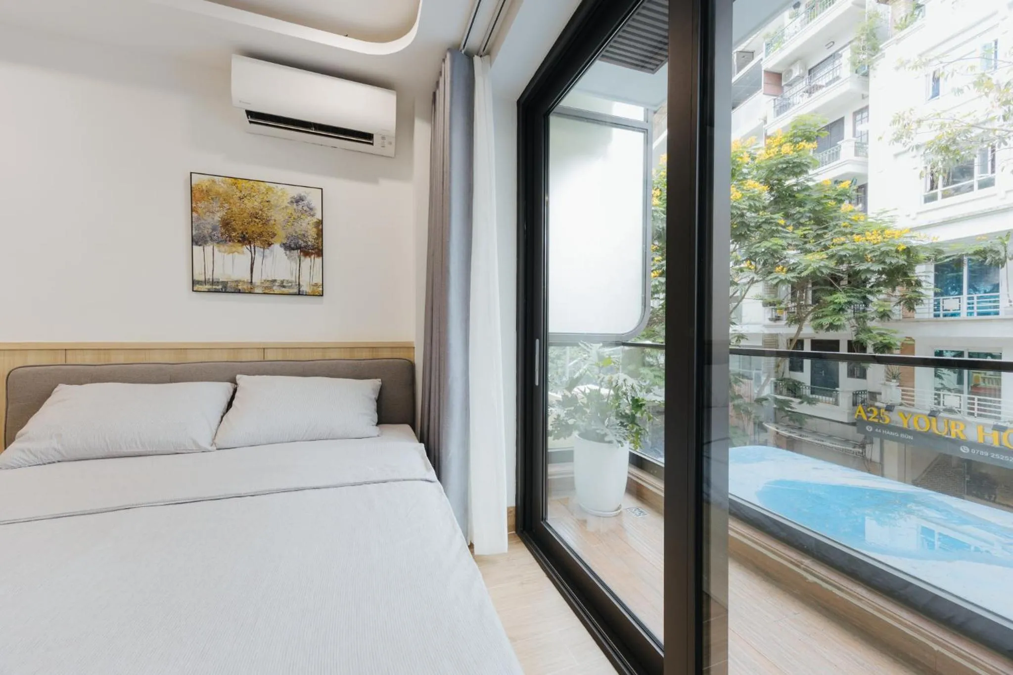 Bed in Wisteria Apartment Hanoi