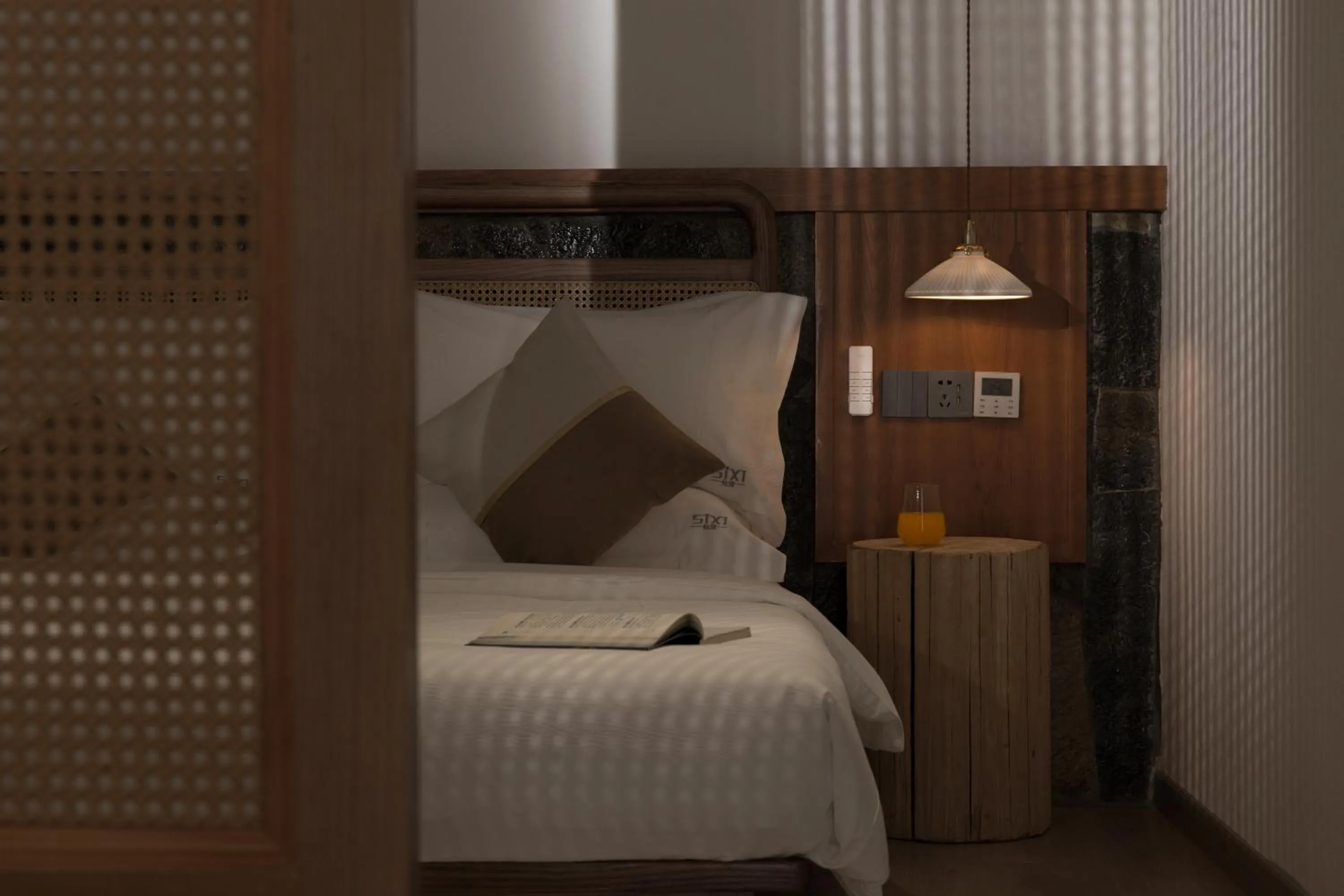 Bed in SIXI Conglu Design Aesthetics Hotel