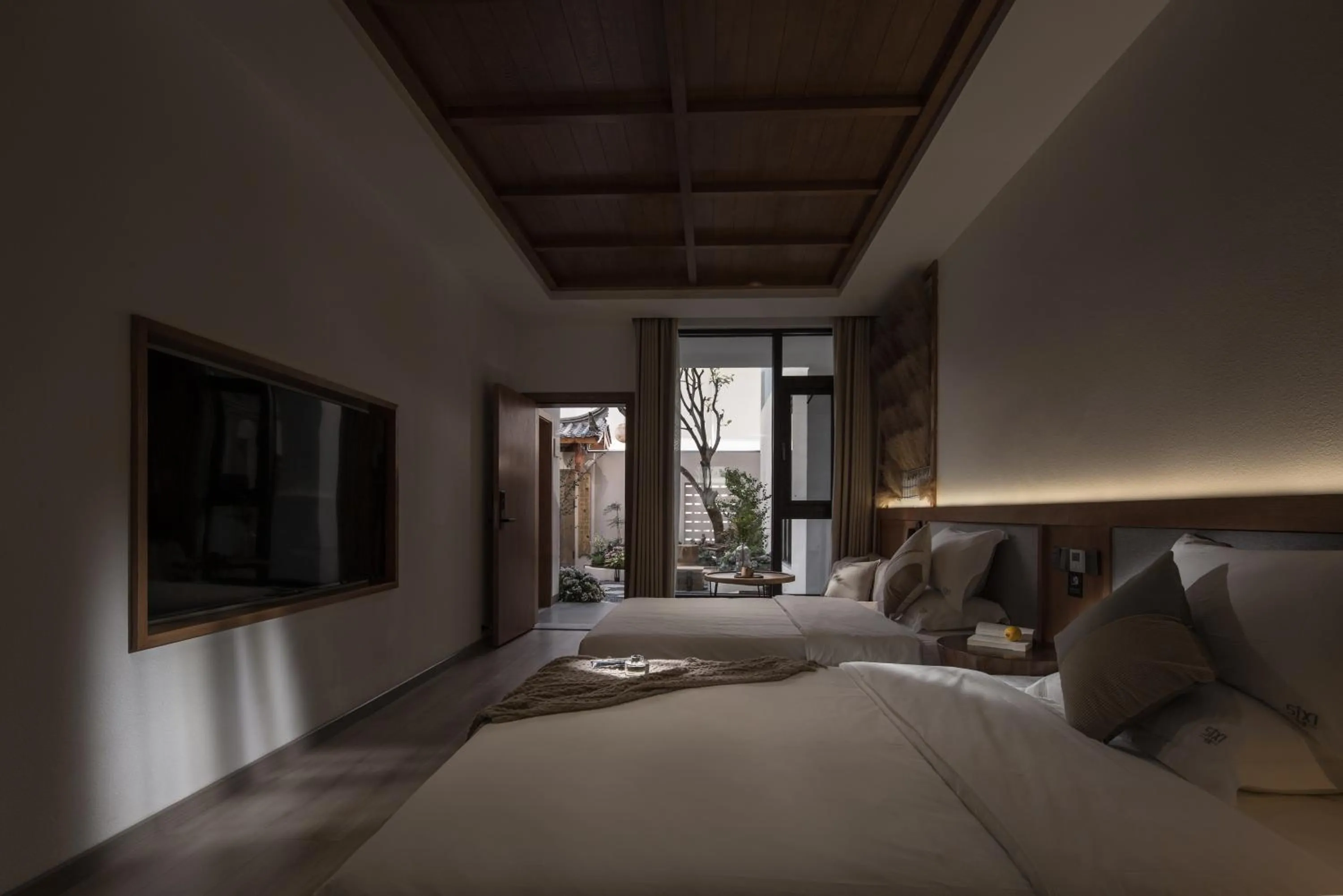 Bed in SIXI Conglu Design Aesthetics Hotel