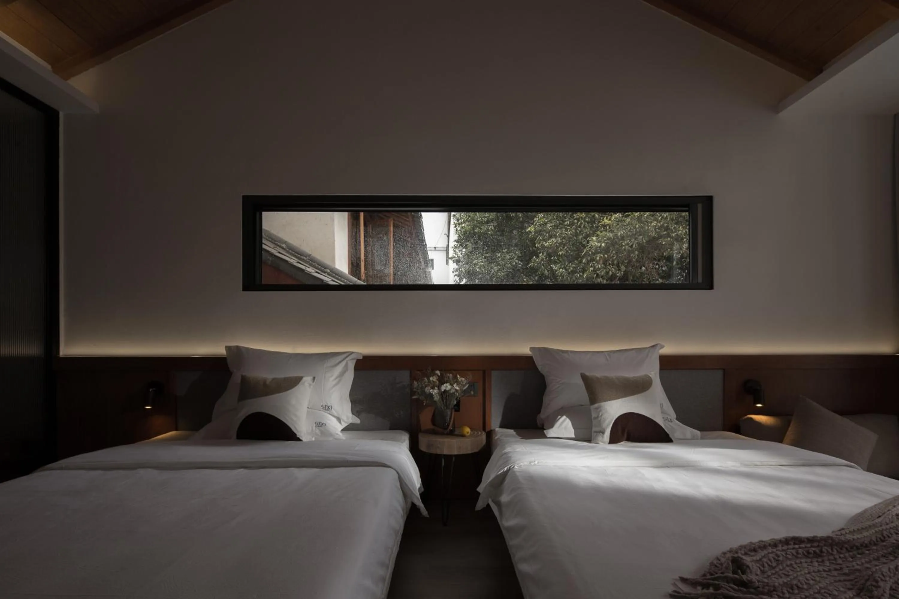 Bed in SIXI Conglu Design Aesthetics Hotel
