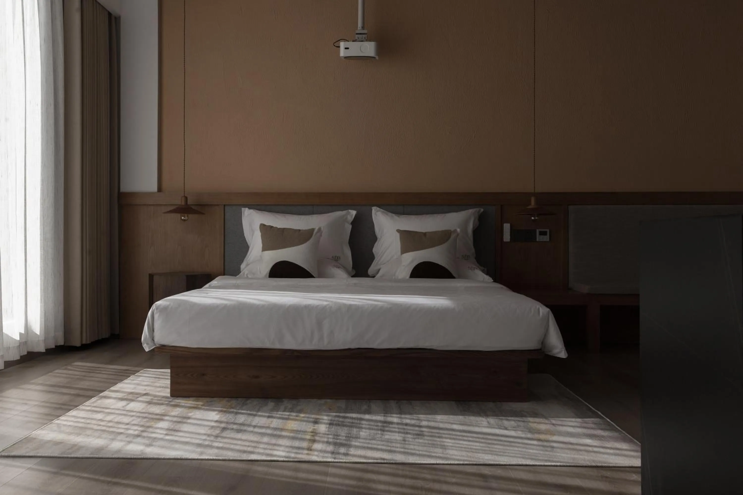 Bed in SIXI Conglu Design Aesthetics Hotel