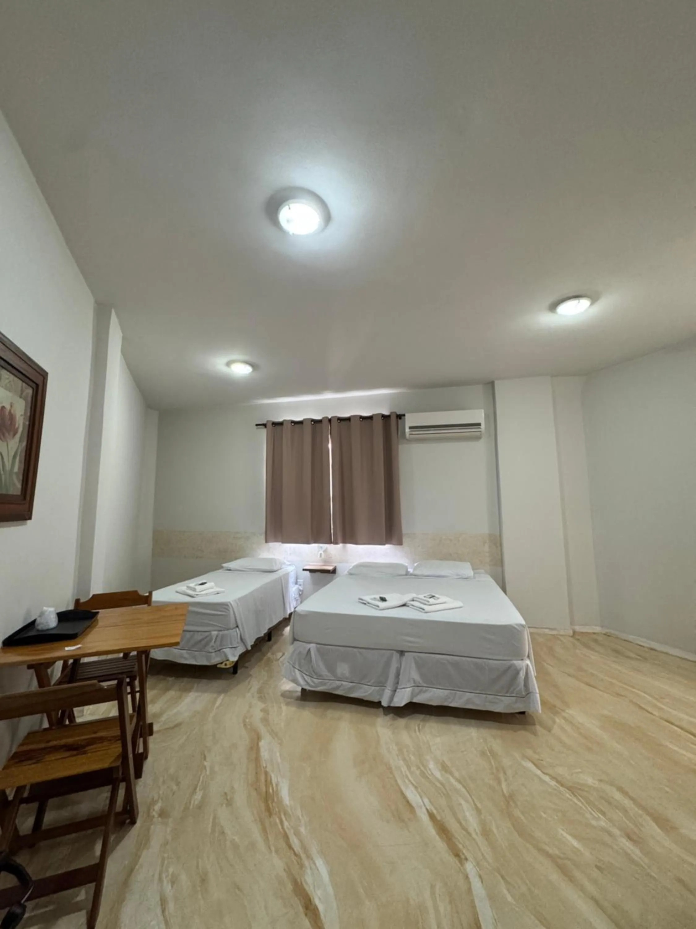 Bed in Hotel Pousada Figueiredo