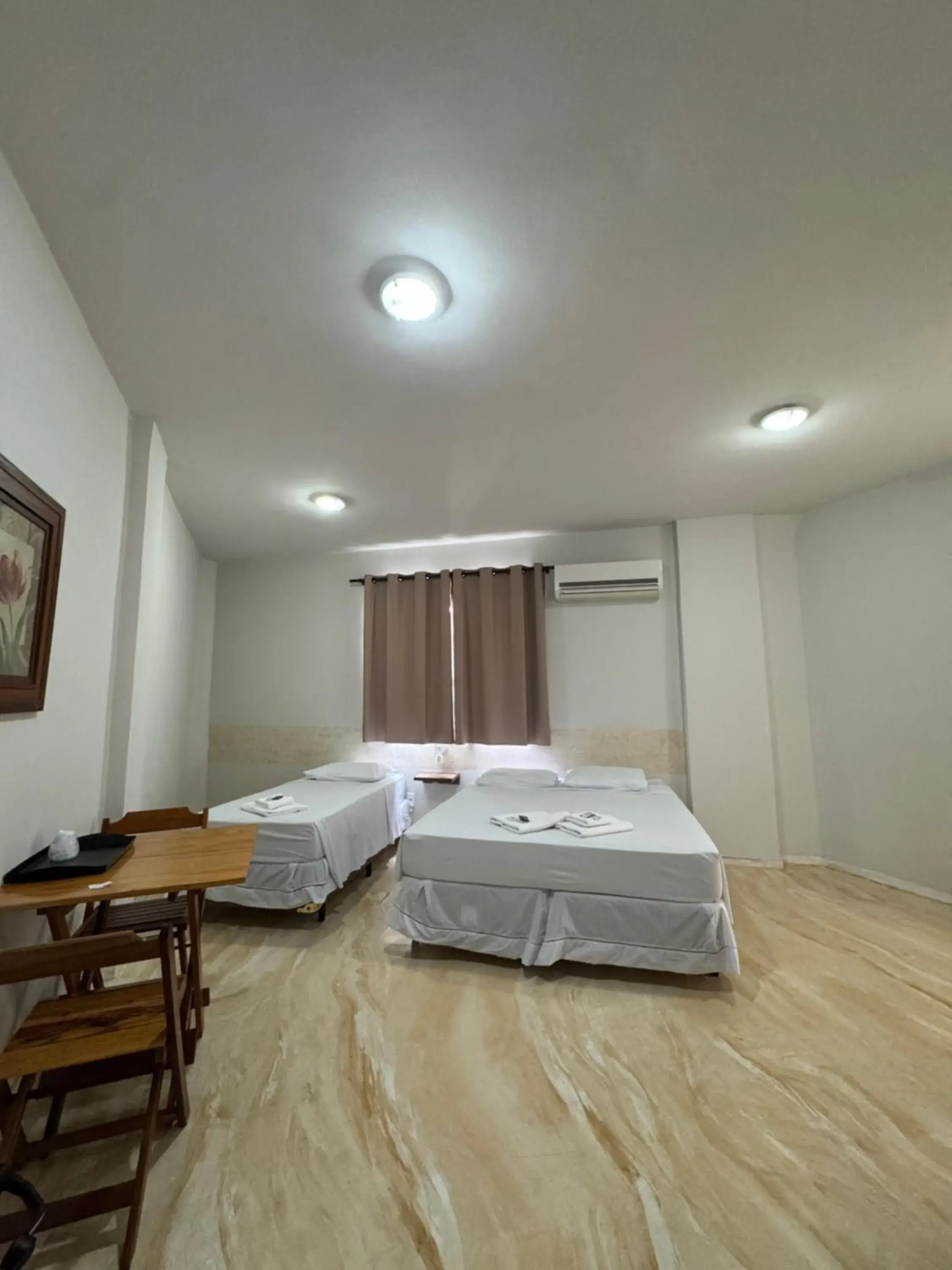 Luxury Triple Room - single occupancy in Hotel Pousada Figueiredo Luxury Triple Room - single occupancy in Hotel Pousada Figueiredo