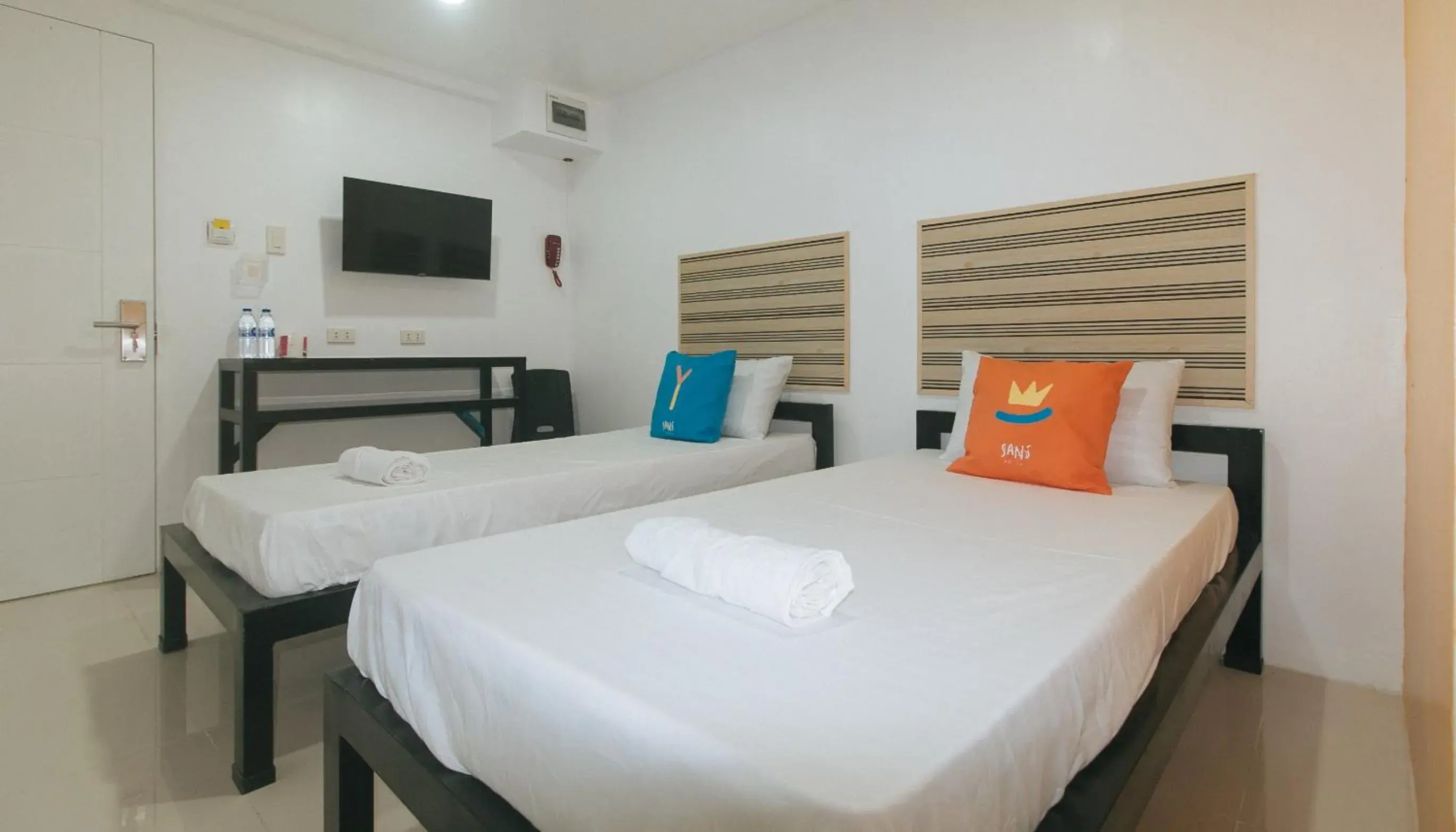 Twin Room in Sans Hotel near Enchanted Kingdom Santa Rosa Laguna Twin Room in Sans Hotel near Enchanted Kingdom Santa Rosa Laguna