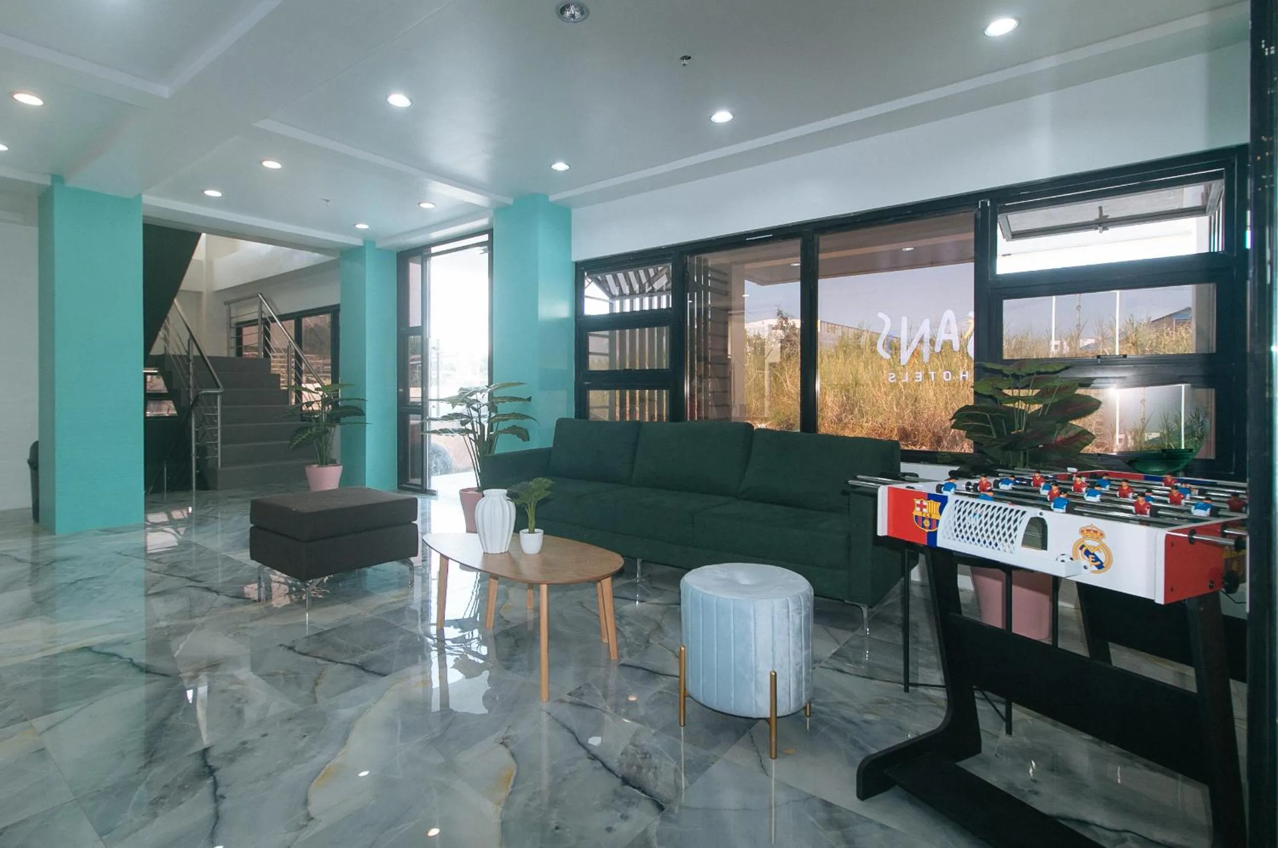 Living room in Sans Hotel near Enchanted Kingdom Santa Rosa Laguna