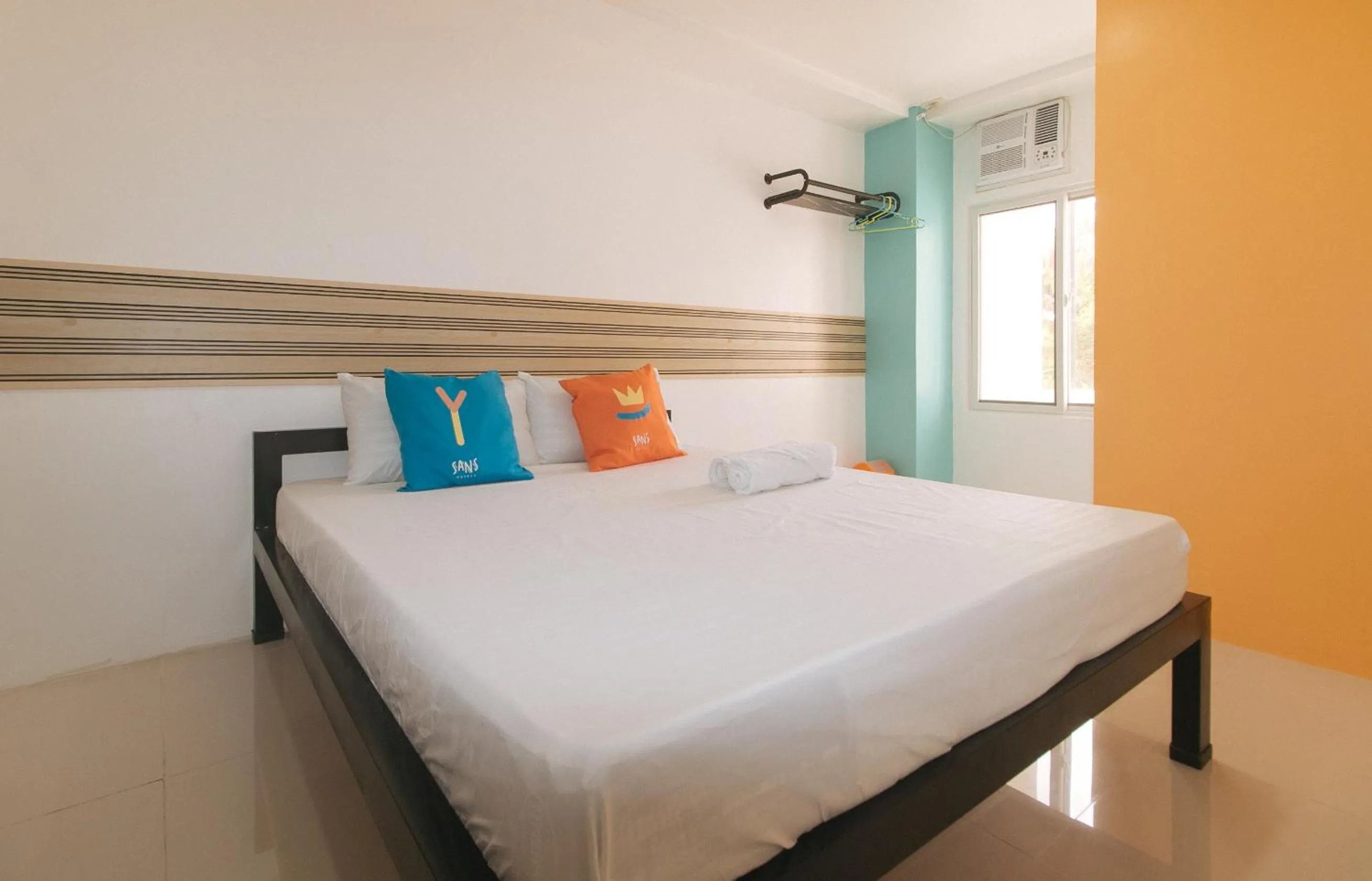Bed in Sans Hotel near Enchanted Kingdom Santa Rosa Laguna