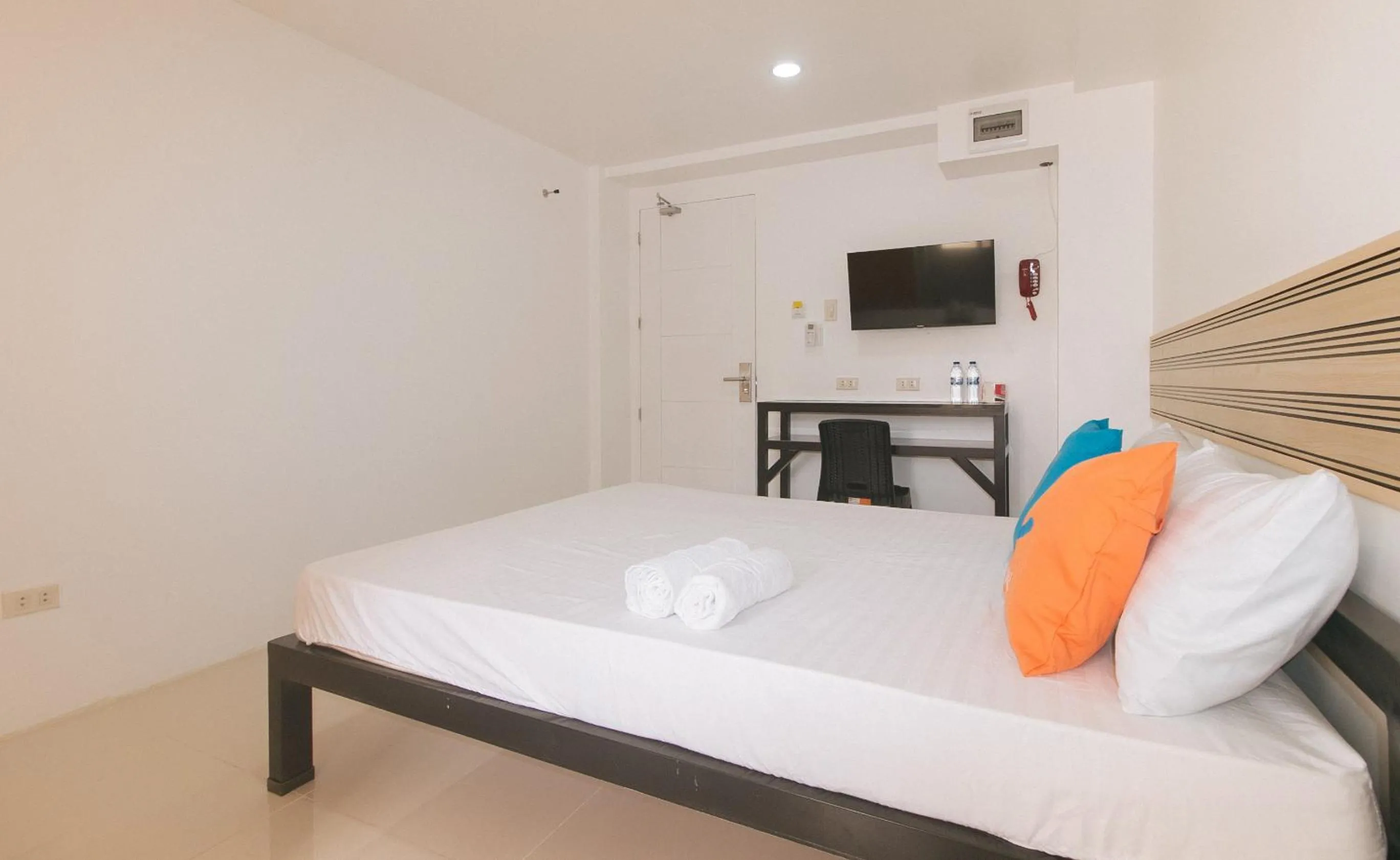 Bed in Sans Hotel near Enchanted Kingdom Santa Rosa Laguna