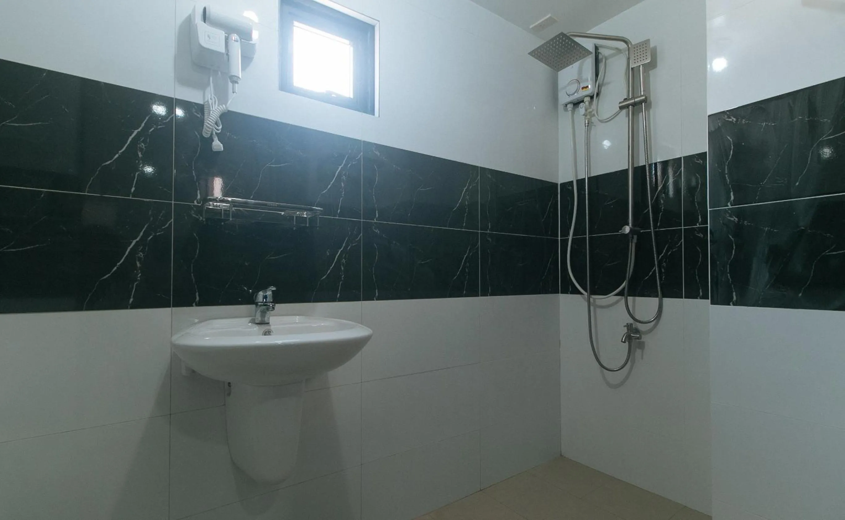 Shower in Sans Hotel near Enchanted Kingdom Santa Rosa Laguna