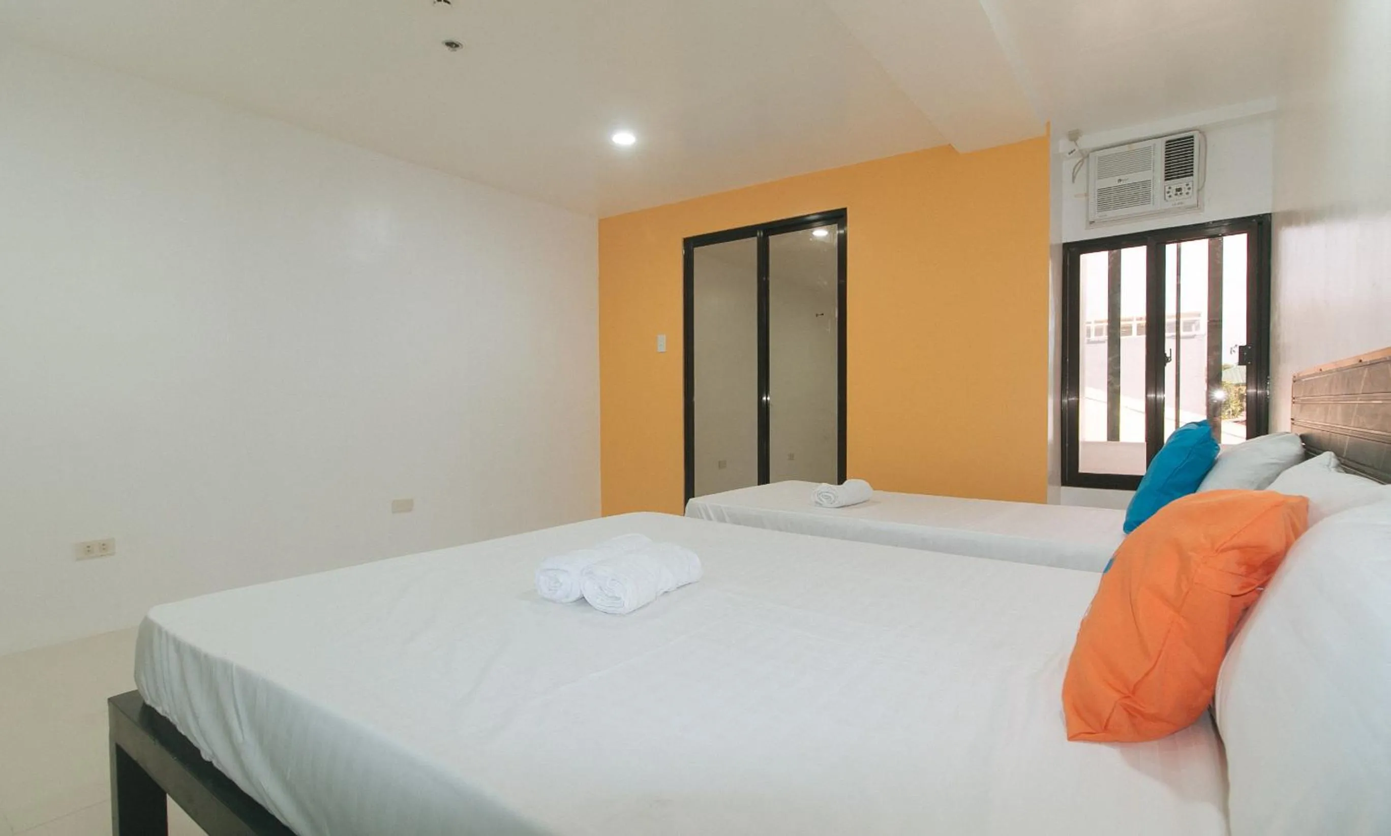 Bed in Sans Hotel near Enchanted Kingdom Santa Rosa Laguna