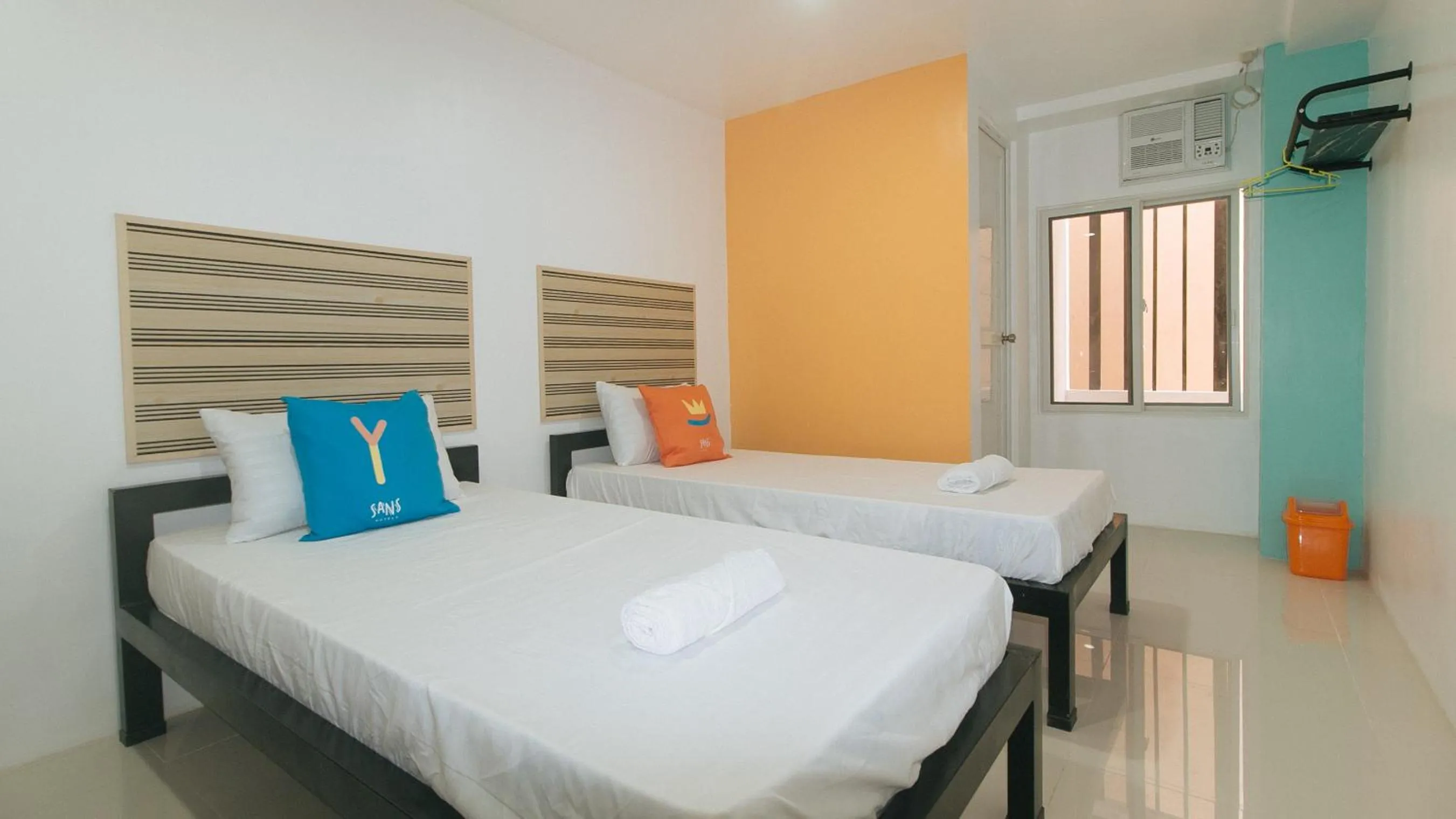 Bed in Sans Hotel near Enchanted Kingdom Santa Rosa Laguna