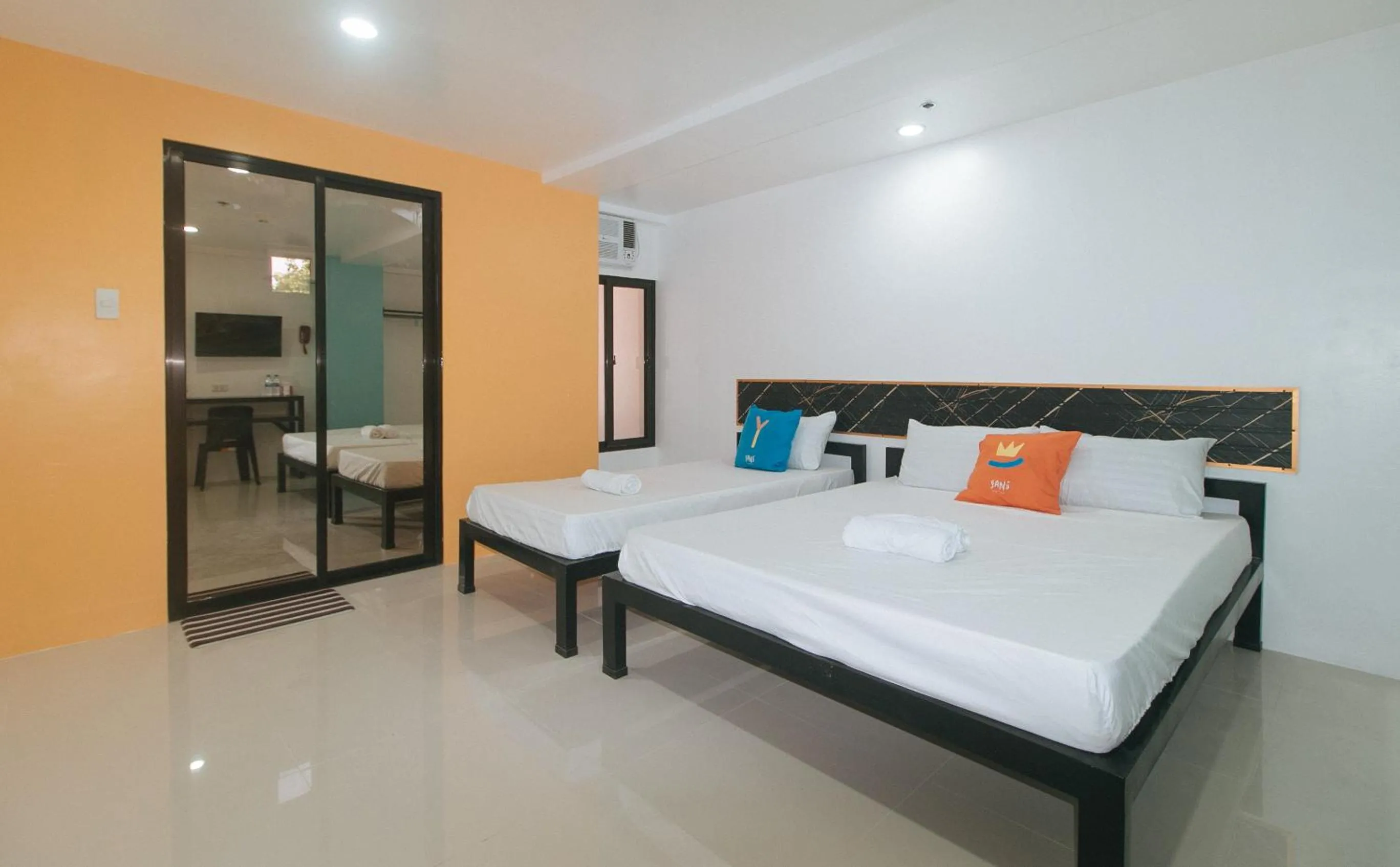 Bed in Sans Hotel near Enchanted Kingdom Santa Rosa Laguna