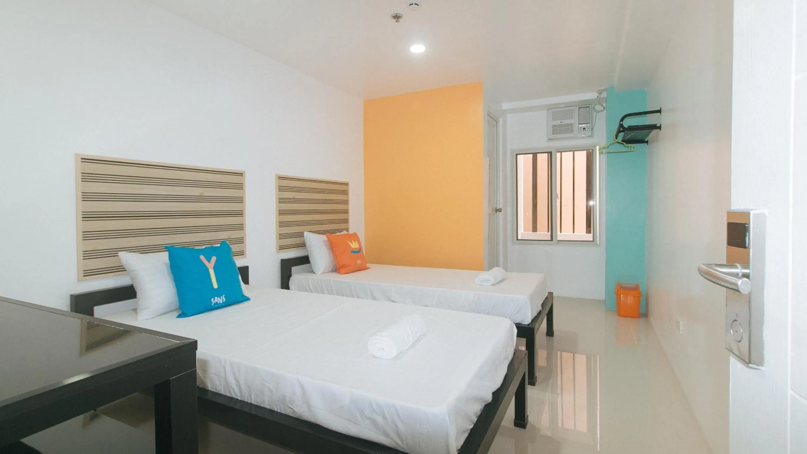 Bed in Sans Hotel near Enchanted Kingdom Santa Rosa Laguna