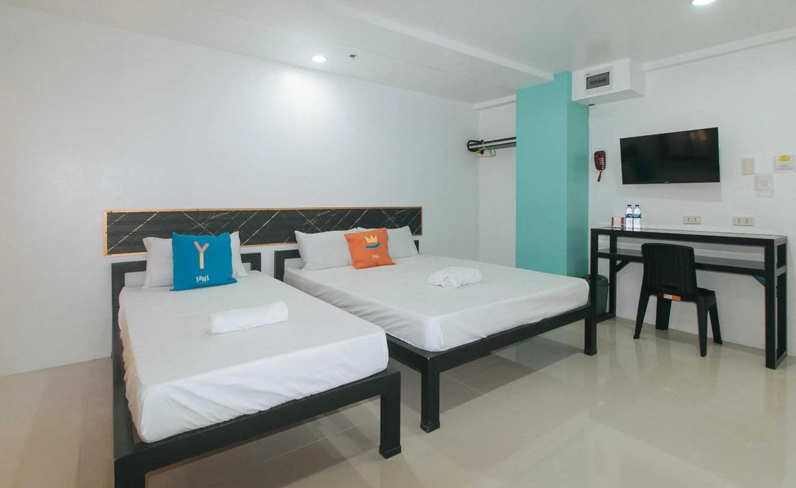 Bed in Sans Hotel near Enchanted Kingdom Santa Rosa Laguna