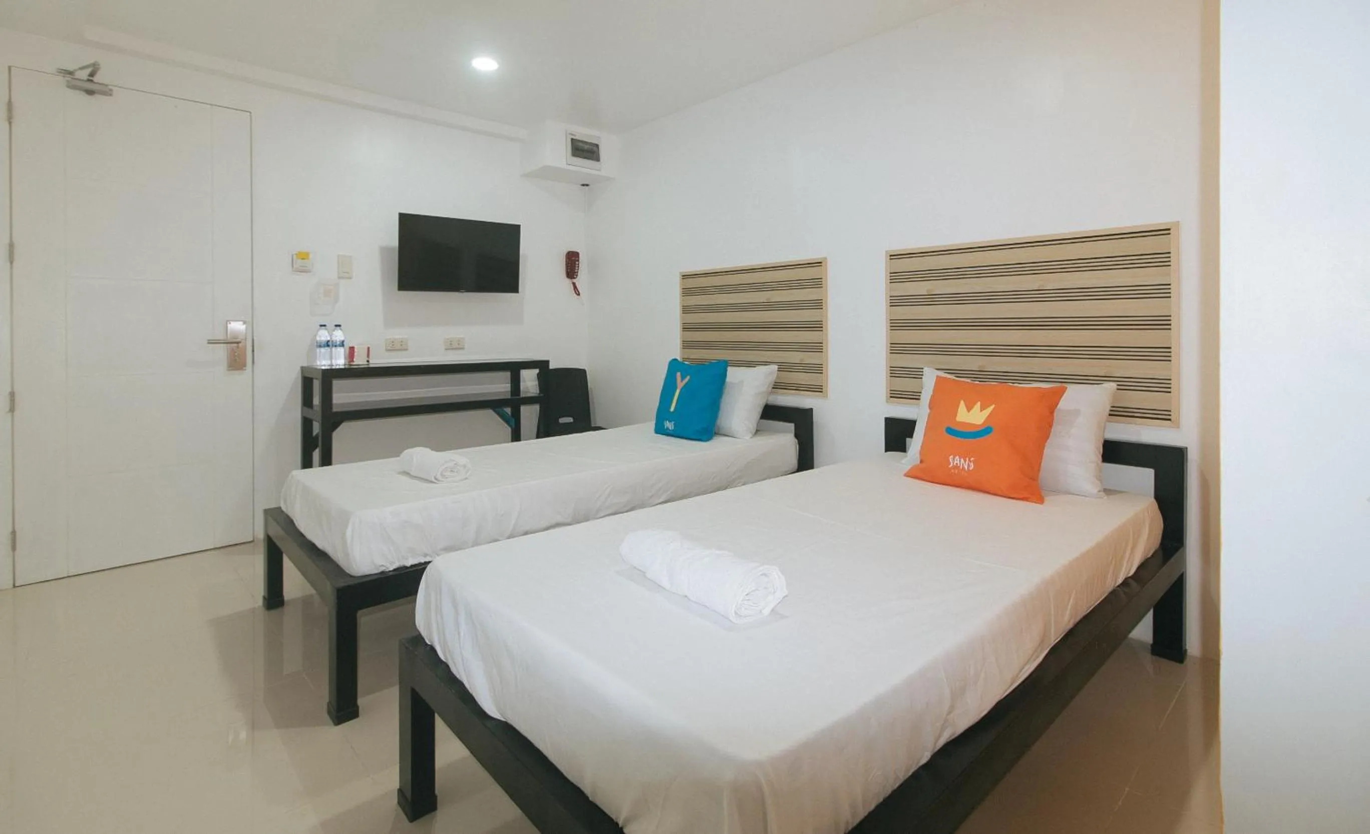 Bed in Sans Hotel near Enchanted Kingdom Santa Rosa Laguna