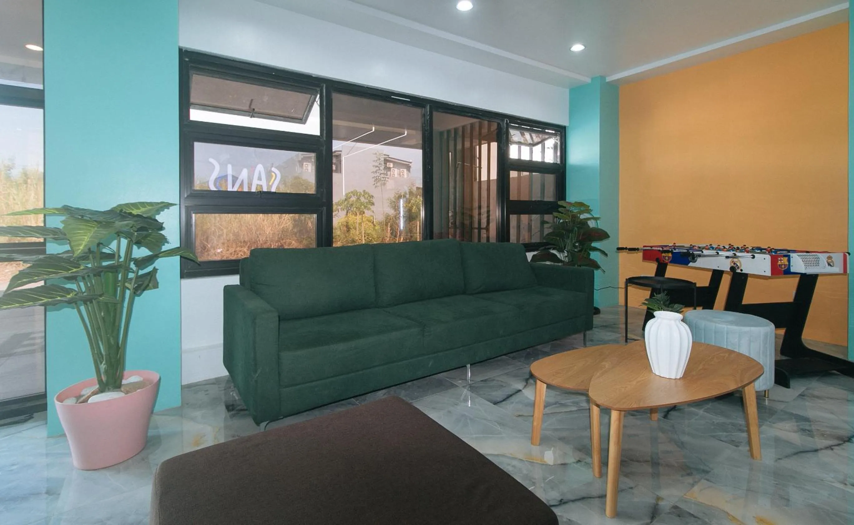Living room in Sans Hotel near Enchanted Kingdom Santa Rosa Laguna
