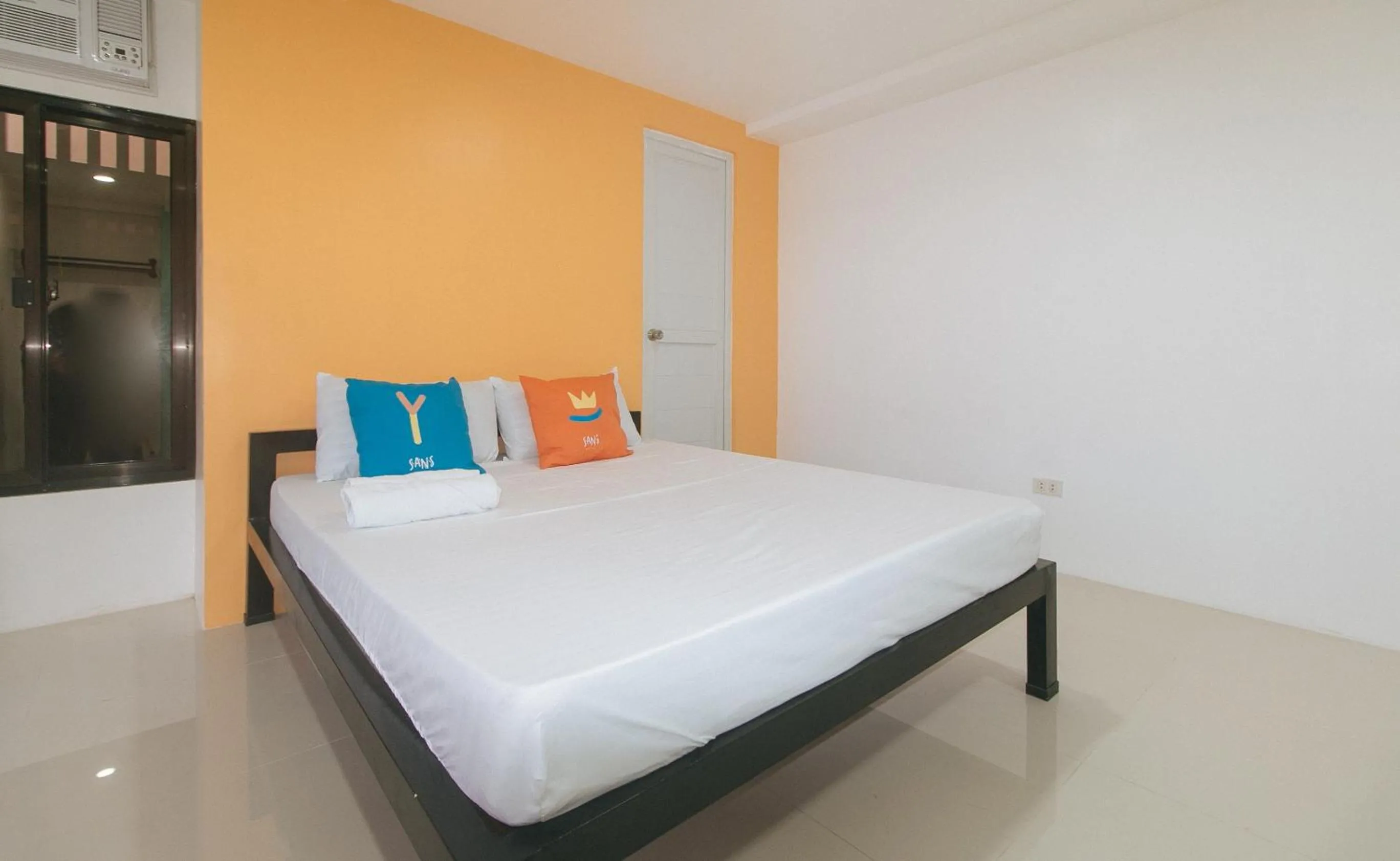 Bed in Sans Hotel near Enchanted Kingdom Santa Rosa Laguna