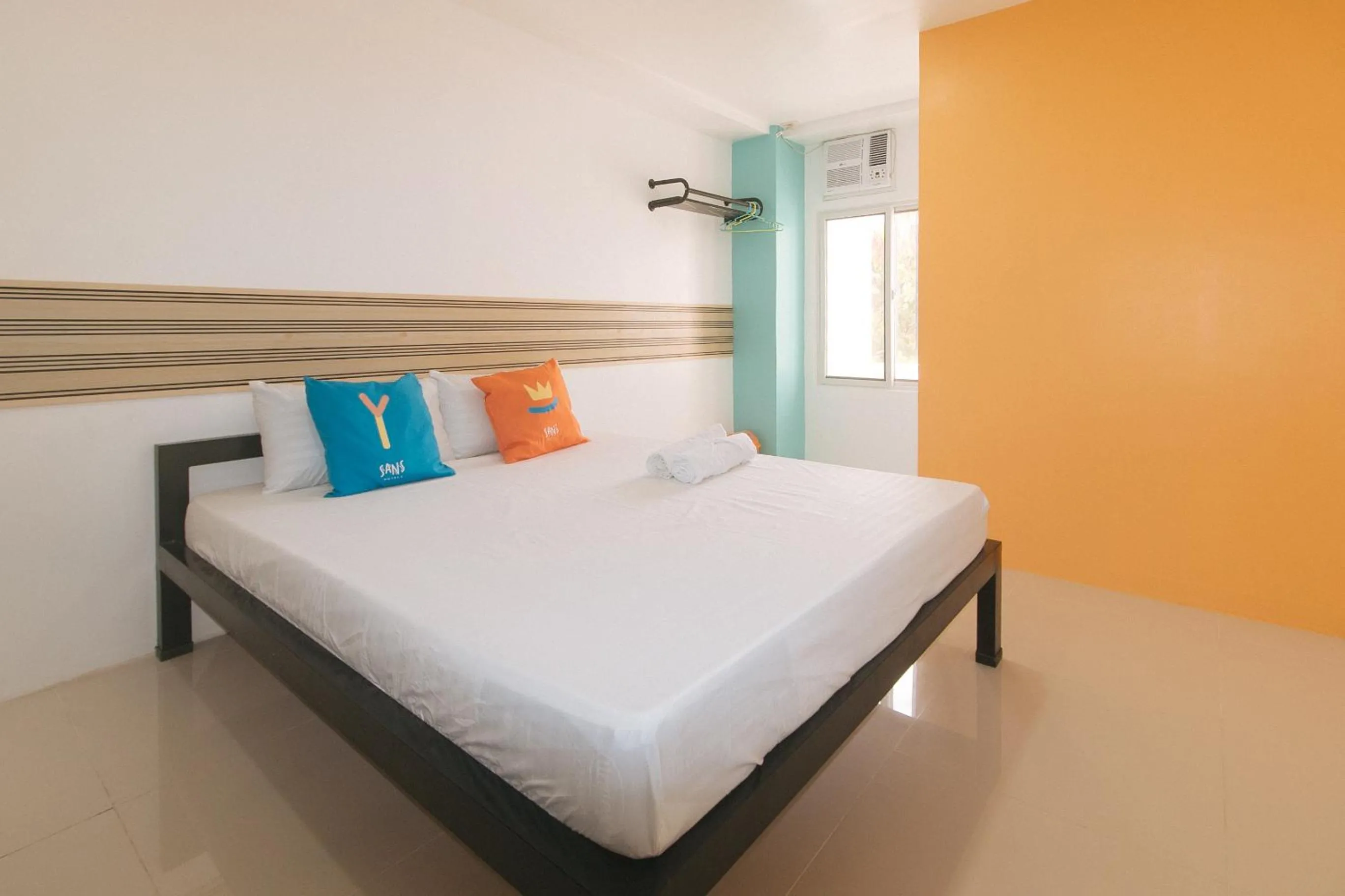 Bed in Sans Hotel near Enchanted Kingdom Santa Rosa Laguna