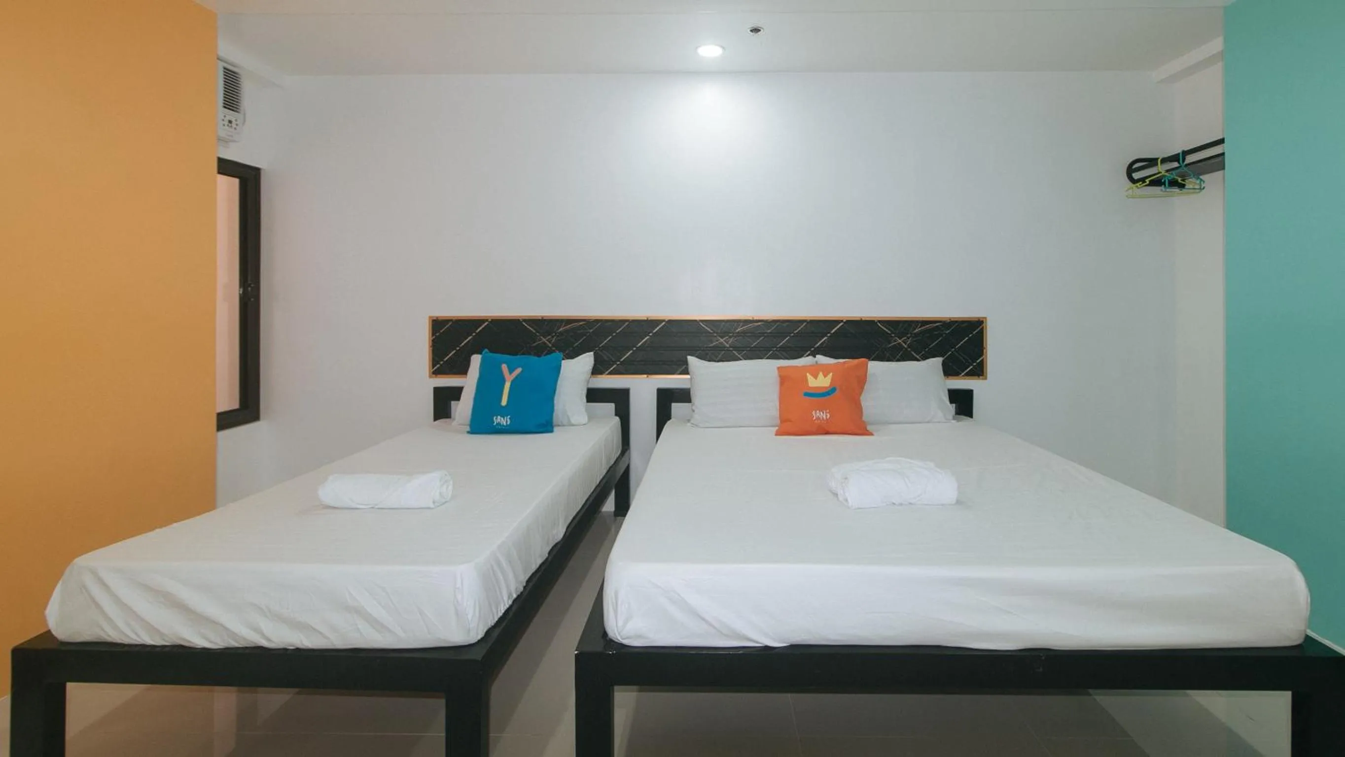 Bed in Sans Hotel near Enchanted Kingdom Santa Rosa Laguna