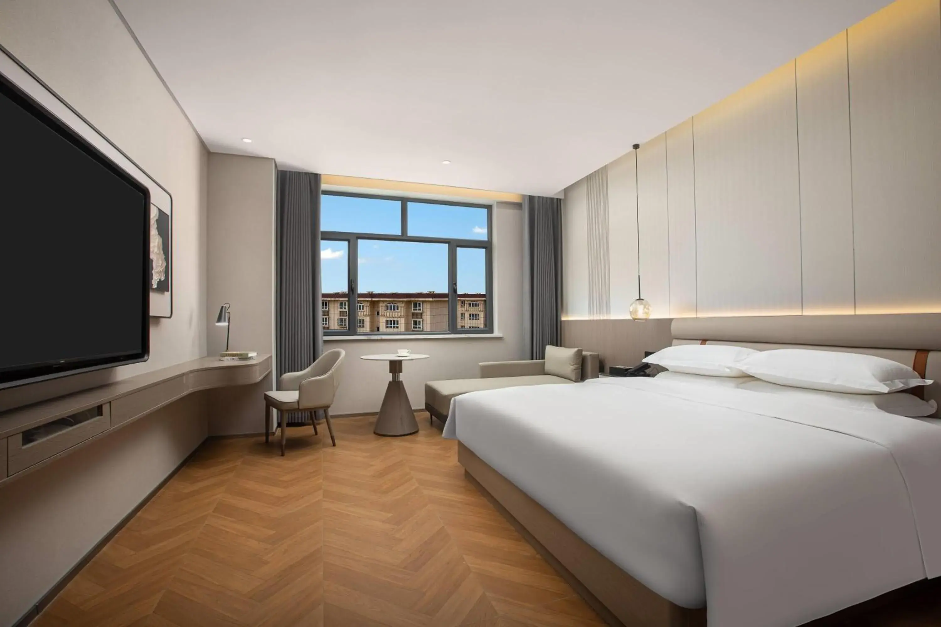 Deluxe King Room - Smoking in Ramada by Wyndham Urumqi Midong Deluxe King Room - Smoking in Ramada by Wyndham Urumqi Midong