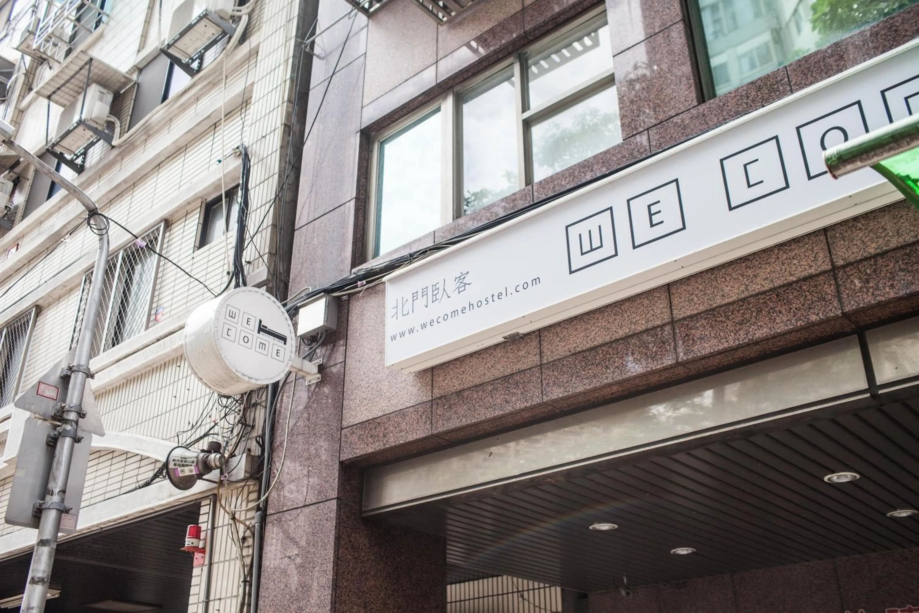 Property building in We Come Hostel