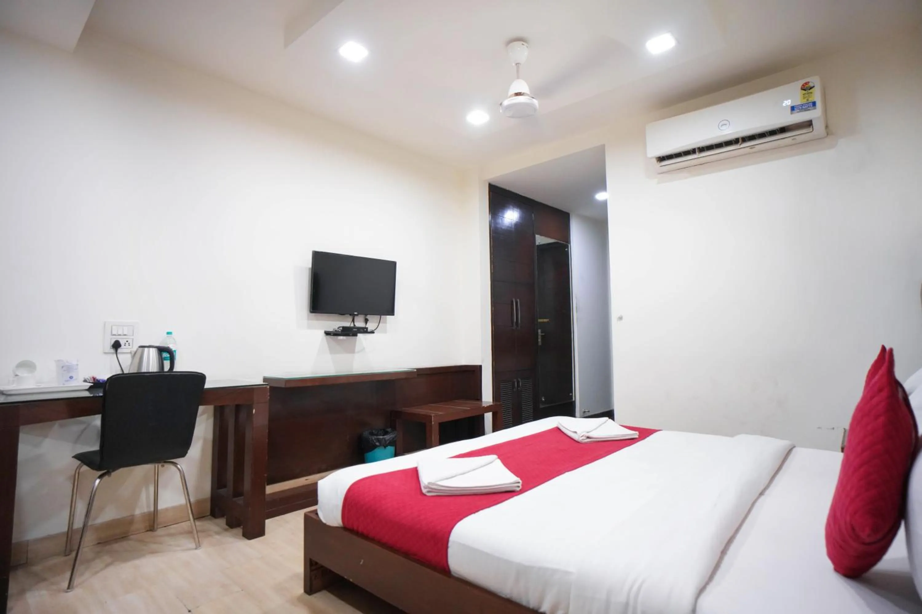 Photo of the whole room, Bed in Hotel Haris MG Road Gurugram