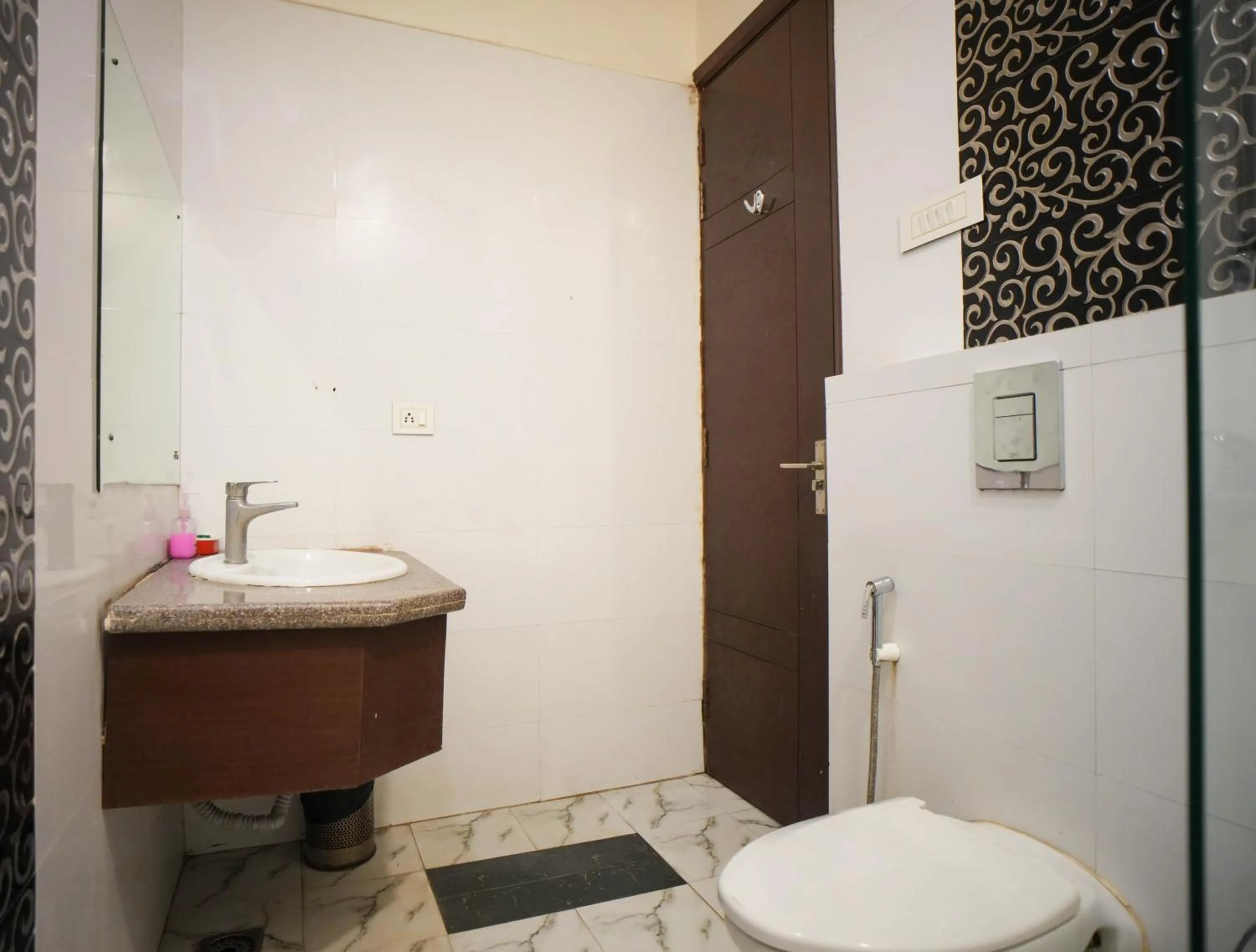 Toilet in Hotel Haris MG Road Gurugram