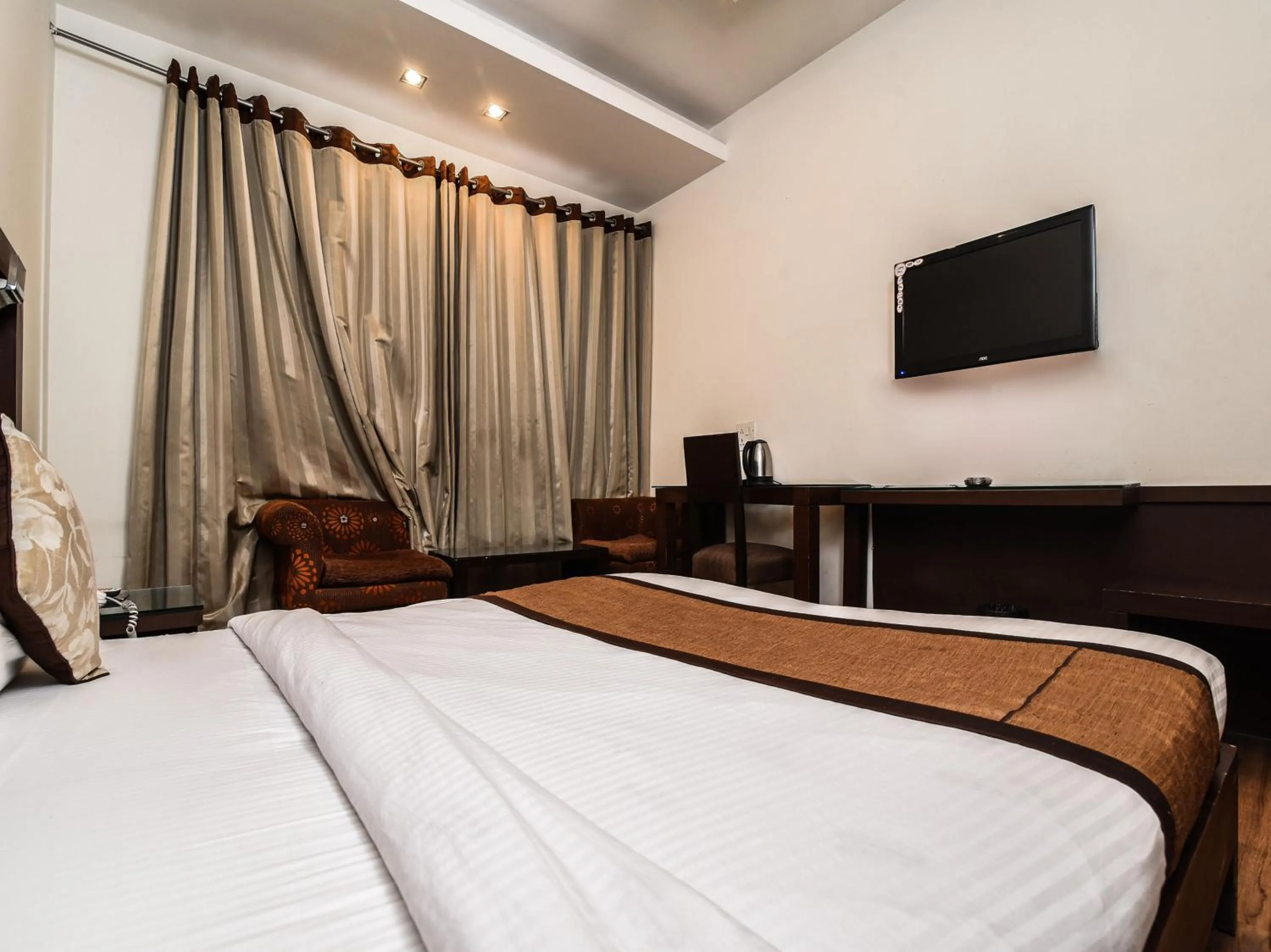 Bedroom, Bed in Hotel Haris MG Road Gurugram