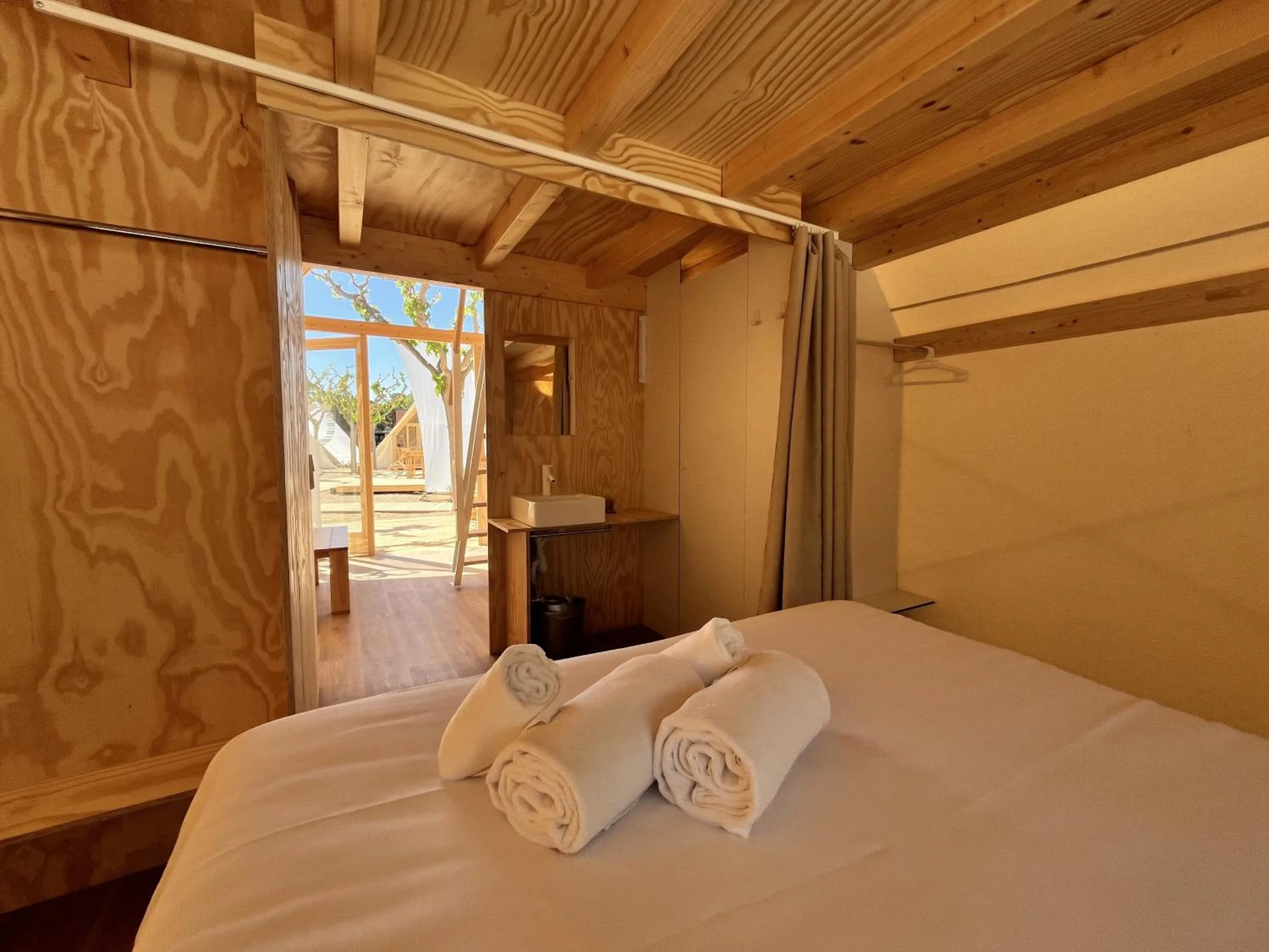 Bed in Tamarit Beach Resort